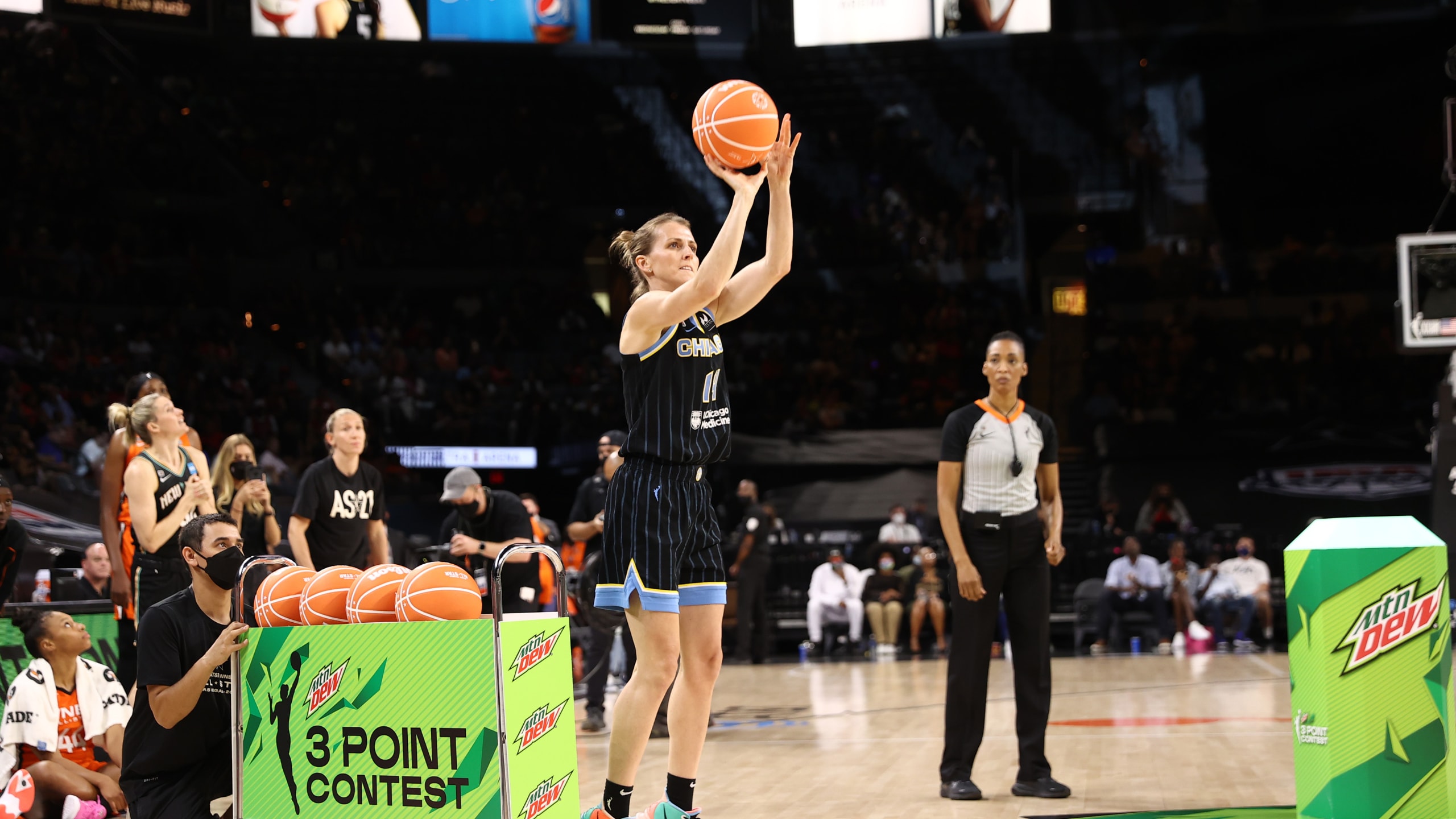 Allie Quigley #14 of the Chicago Sky competes in the final round of the 3-Point Contest during halftime during the AT&T WNBA All-Star Game 2021