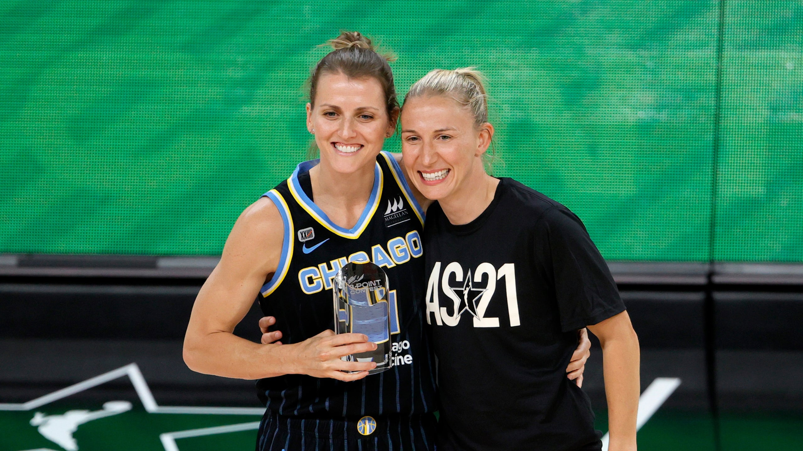 Allie Quigley #14 of the Chicago Sky and her wife, Courtney Vandersloot #22 of Team WNBA