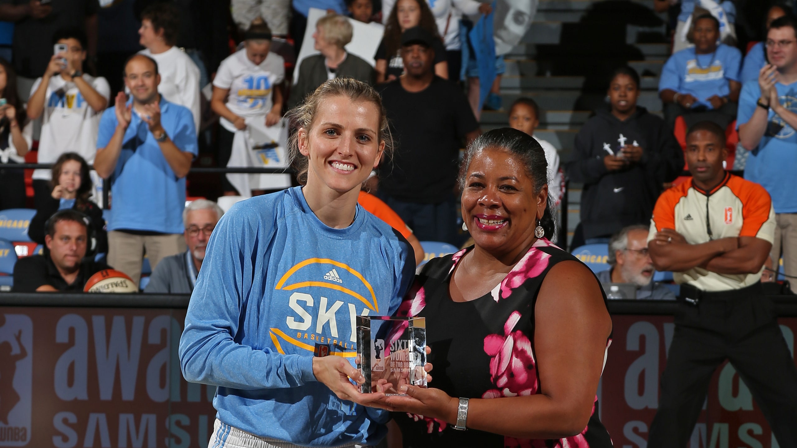Allie Quigley #14 of the Chicago Sky poses for a photo with Laurel J. Richie, President of the WNBA, while receiving her award for WNBA Sixth Woman of the Year before the game against the Indiana Fever during Game One of the Eastern Conference Semifinals