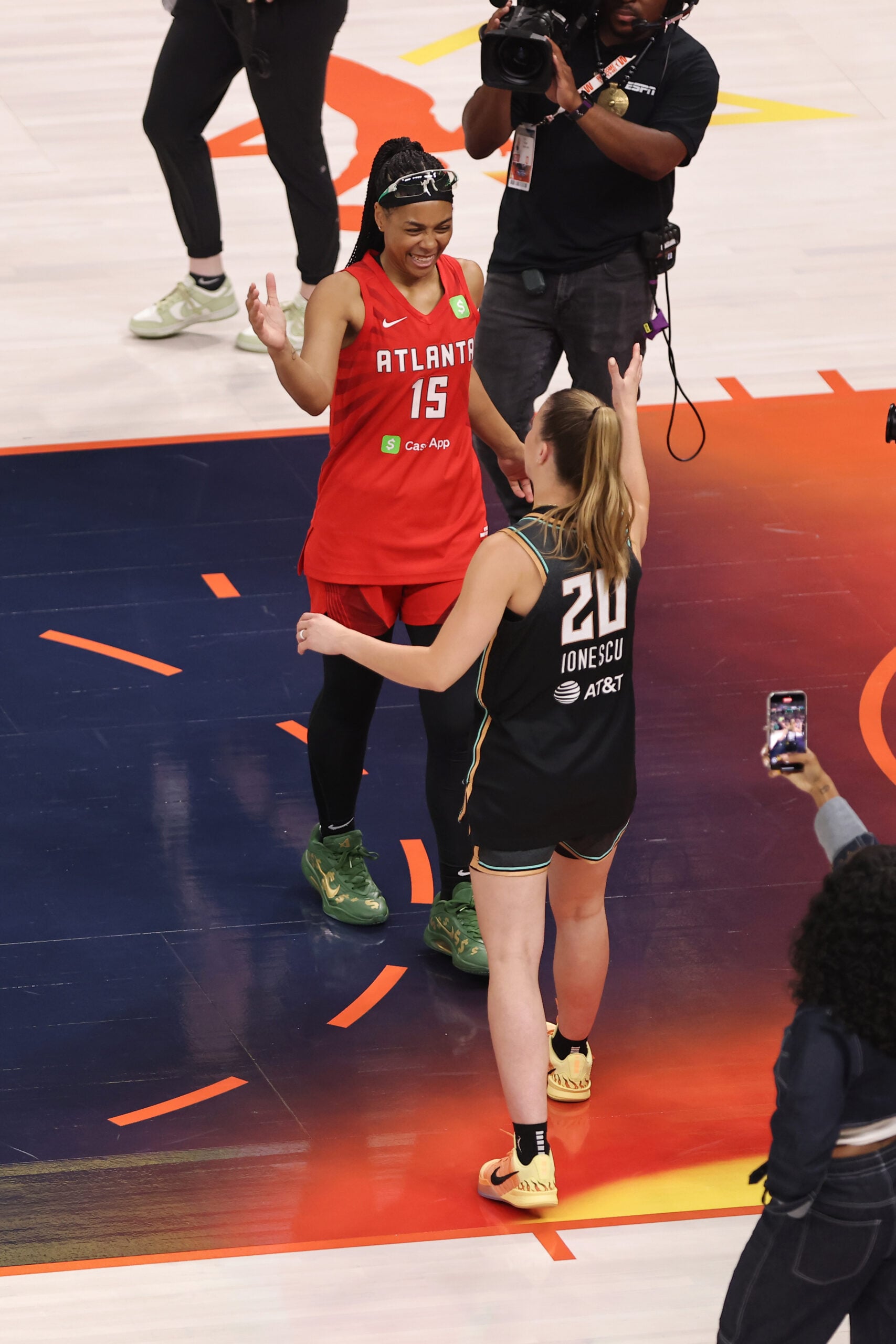 Allisha Gray #15 of the Atlanta Dream and Sabrina Ionescu #20 of the New York Liberty high five during the Kia WNBA Skills Challenge and WNBA STARRY 3-Point Contest as part of AT&T WNBA All-Star 2025 on July 18, 2025 at Gainbridge Fieldhouse in Indianapolis, Indiana.