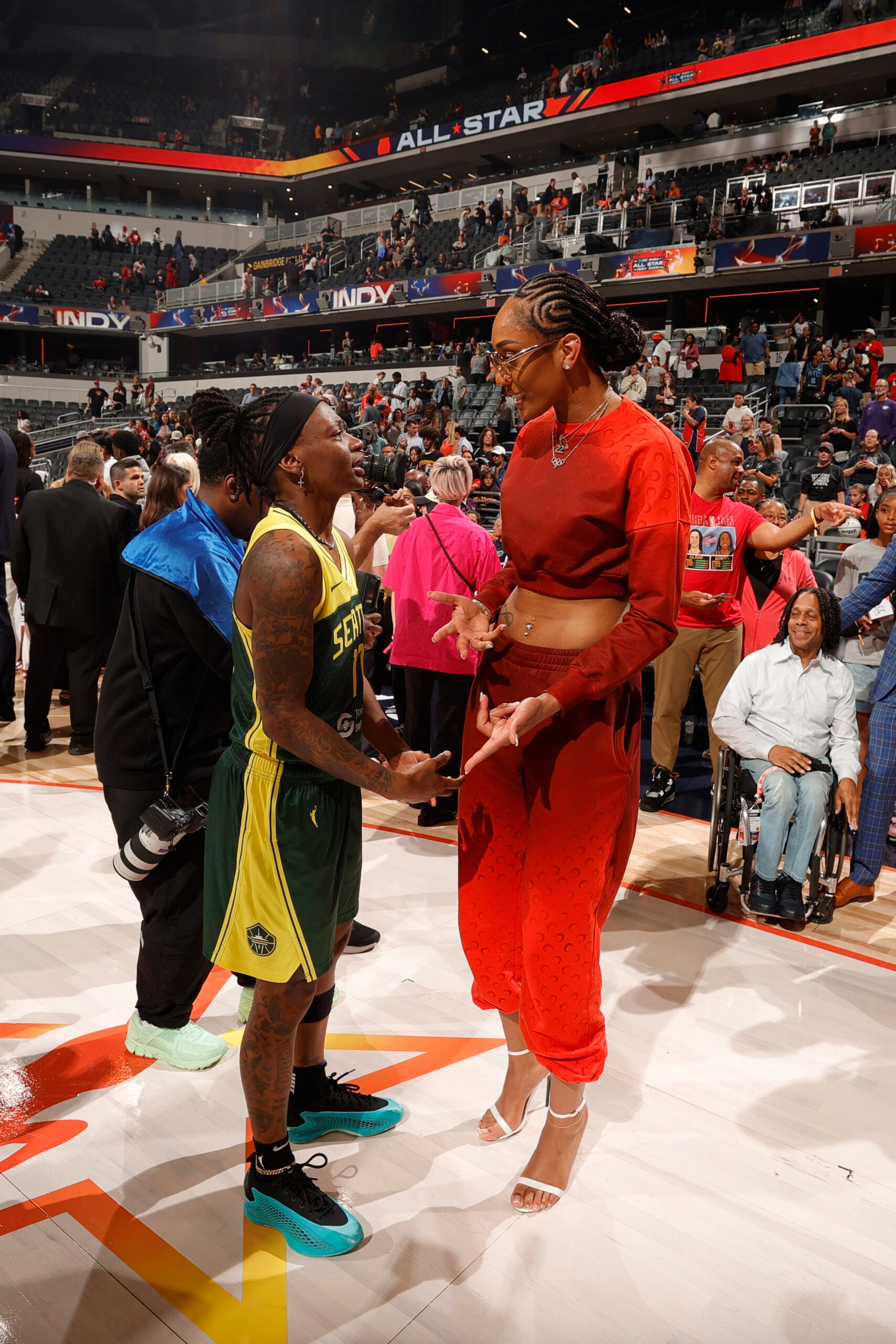 Erica Wheeler #17 of the Seattle Storm greets A'ja Wilson #22 of the Las Vegas Aces during the Kia WNBA Skills Challenge and WNBA STARRY 3-Point Contest on July 18, 2025 at Gainbridge Fieldhouse in Indianapolis, Indiana.