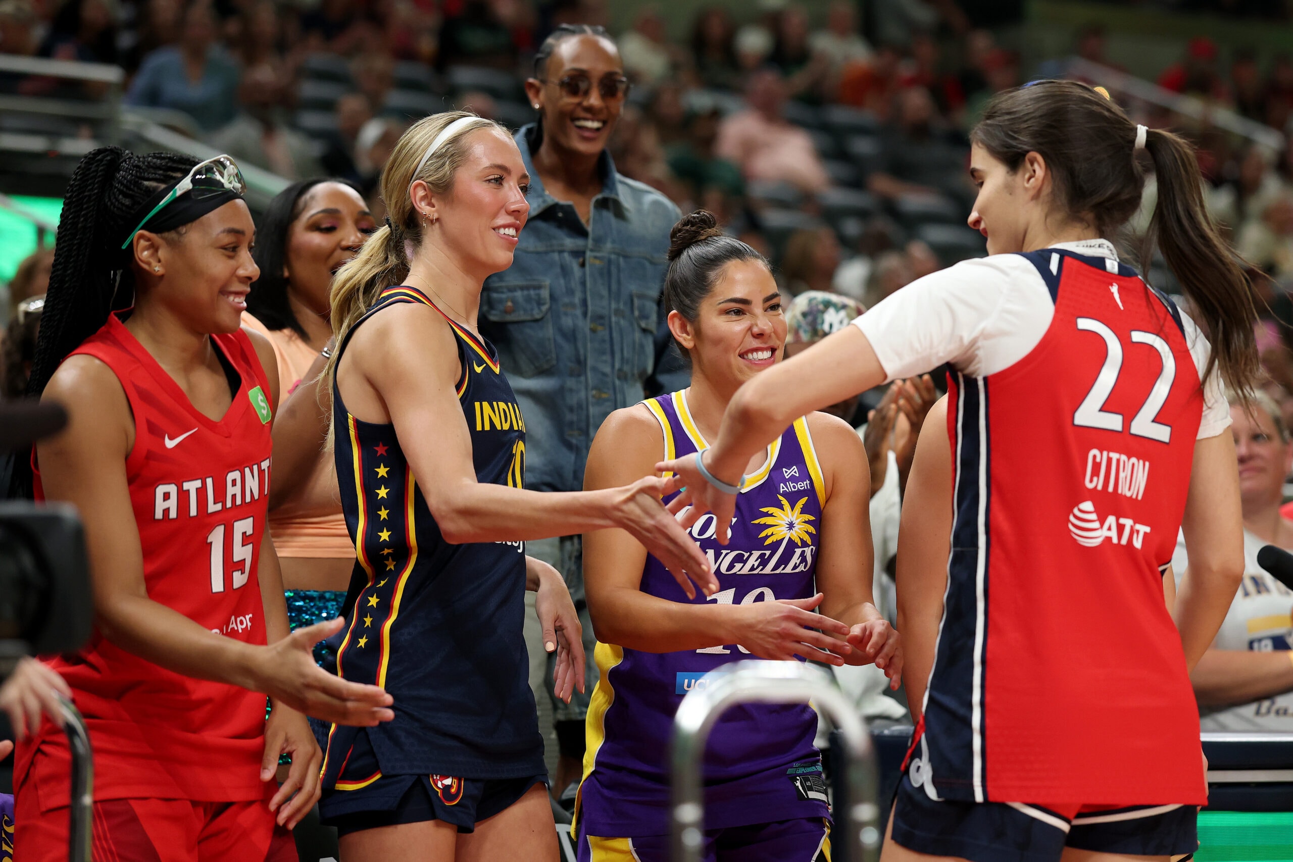 Sonia Citron #2 of the Washington Mystics (R) celebrates with Allisha Gray #15 of the Atlanta Dream, Lexie Hull #10 of the Indiana Fever, and Kelsey Plum #10 of the Los Angeles Sparks after competing in the WNBA STARRY 3-Point Contest during the 2025 AT&T WNBA All-Star weekend at Gainbridge Fieldhouse on July 18, 2025 in Indianapolis, Indiana.