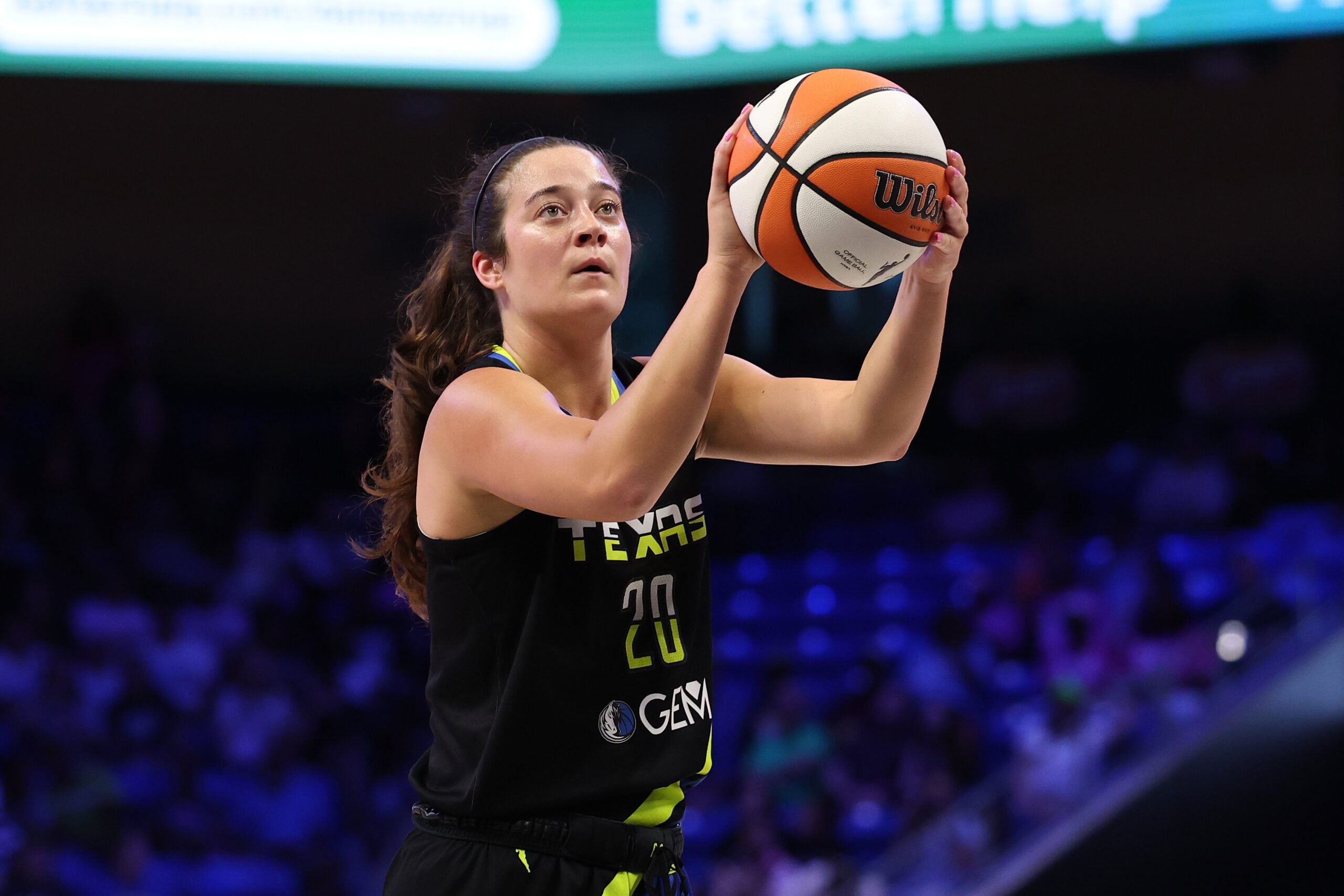 Maddy Siegrist #20 of the Dallas Wings takes a shot during the first half of a game against the Los Angeles Sparks
