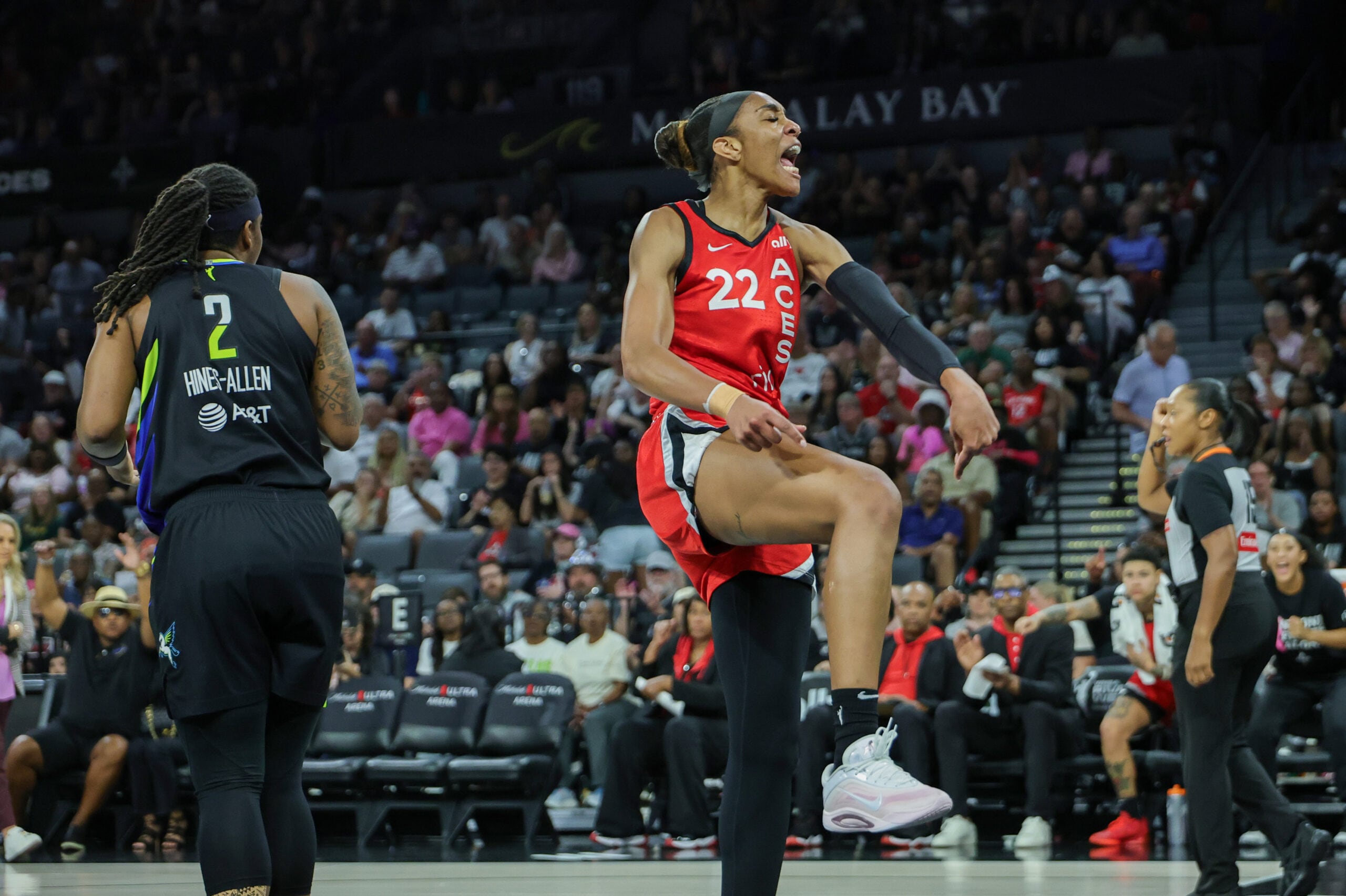 A'ja Wilson #22 of the Las Vegas Aces reacts after scoring a basket and drawing a foul against the Dallas Wings