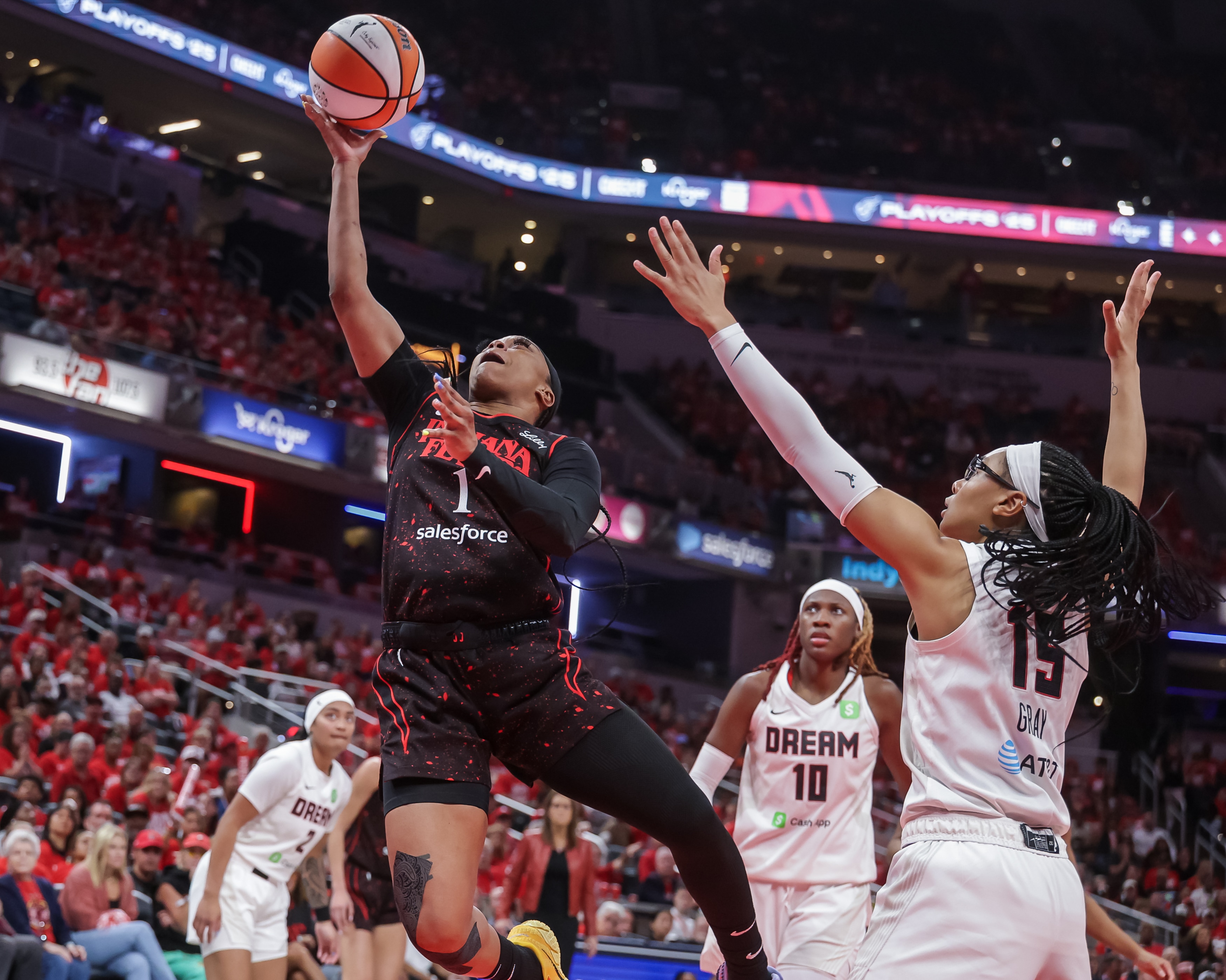 Odyssey Sims #1 of the Indiana Fever attempts a lay up vs. the Atlanta Dream.