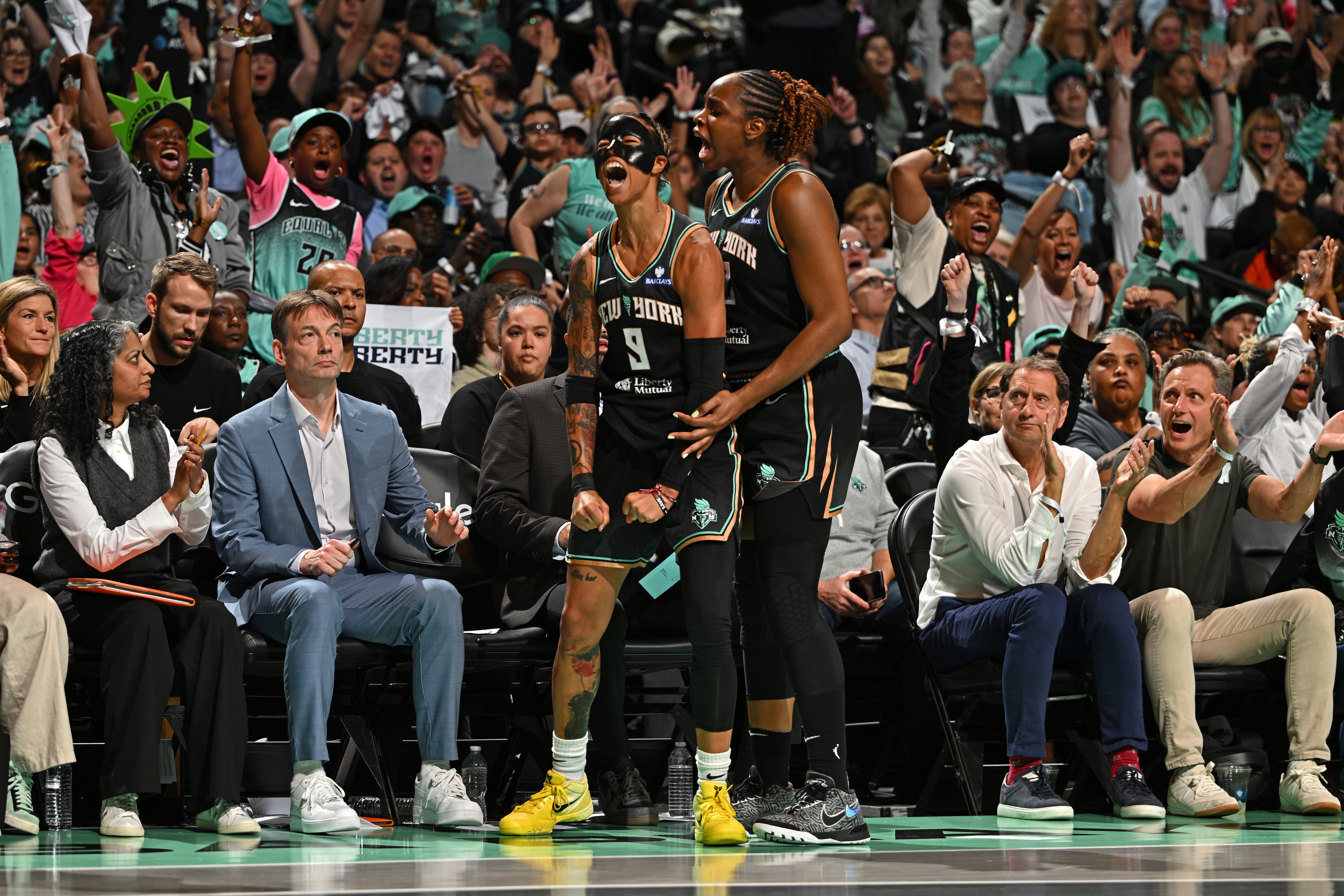 BROOKLYN, NY - SEPTEMBER 17: Natasha Cloud #9 and Kennedy Burke #22 of the New York Liberty celebrates during the game against the Phoenix Mercury during round 2 game 1 on September 17, 2025 at Barclays Center Arena in Brooklyn, New York. NOTE TO USER: User expressly acknowledges and agrees that, by downloading and or using this photograph, User is consenting to the terms and conditions of the Getty Images License Agreement. Mandatory Copyright Notice: Copyright 2025 NBAE(Photo by Catalina Fragoso/NBAE via Getty Images)