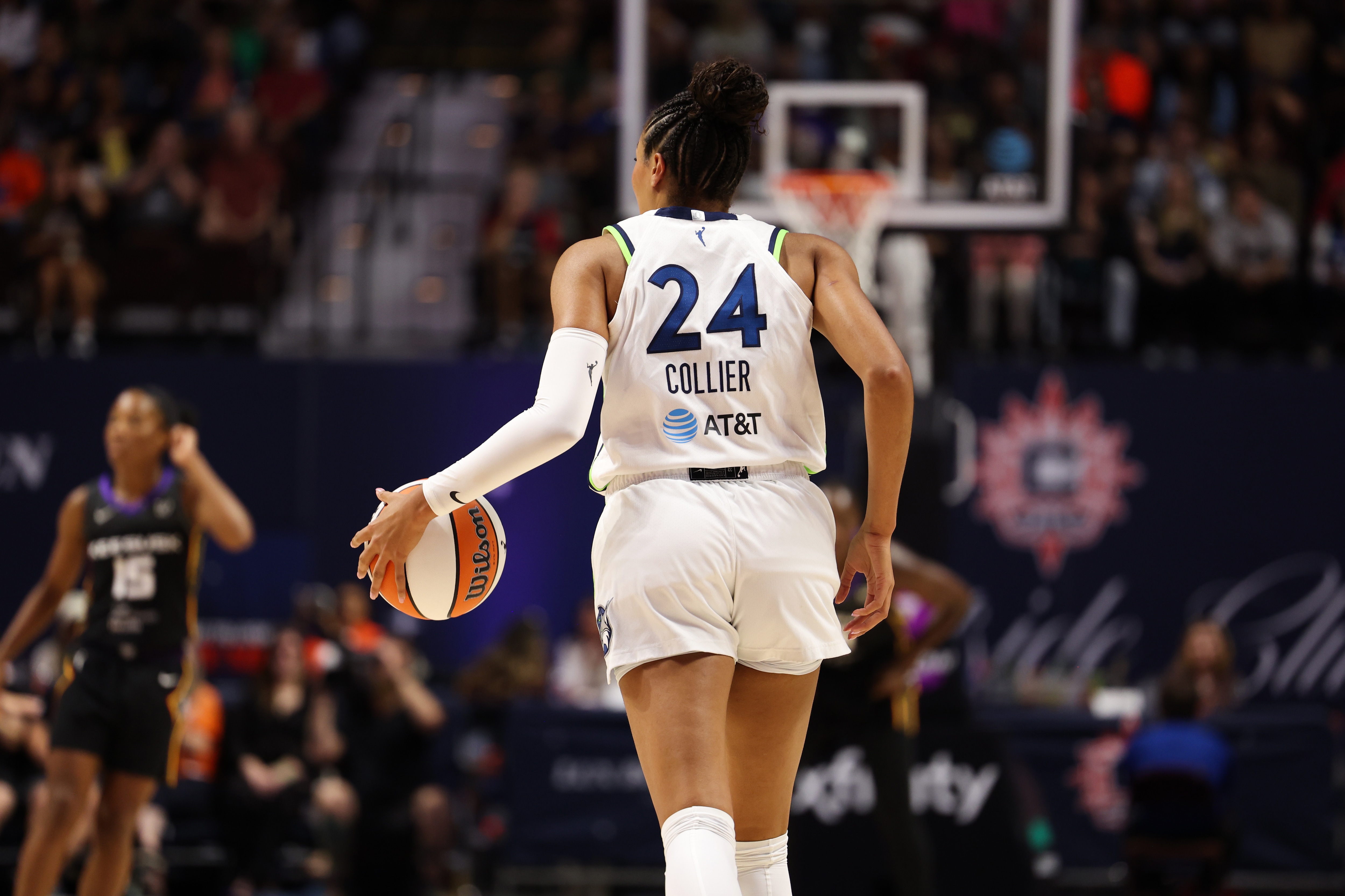 Napheesa Collier #24 of the Minnesota Lynx handles the ball