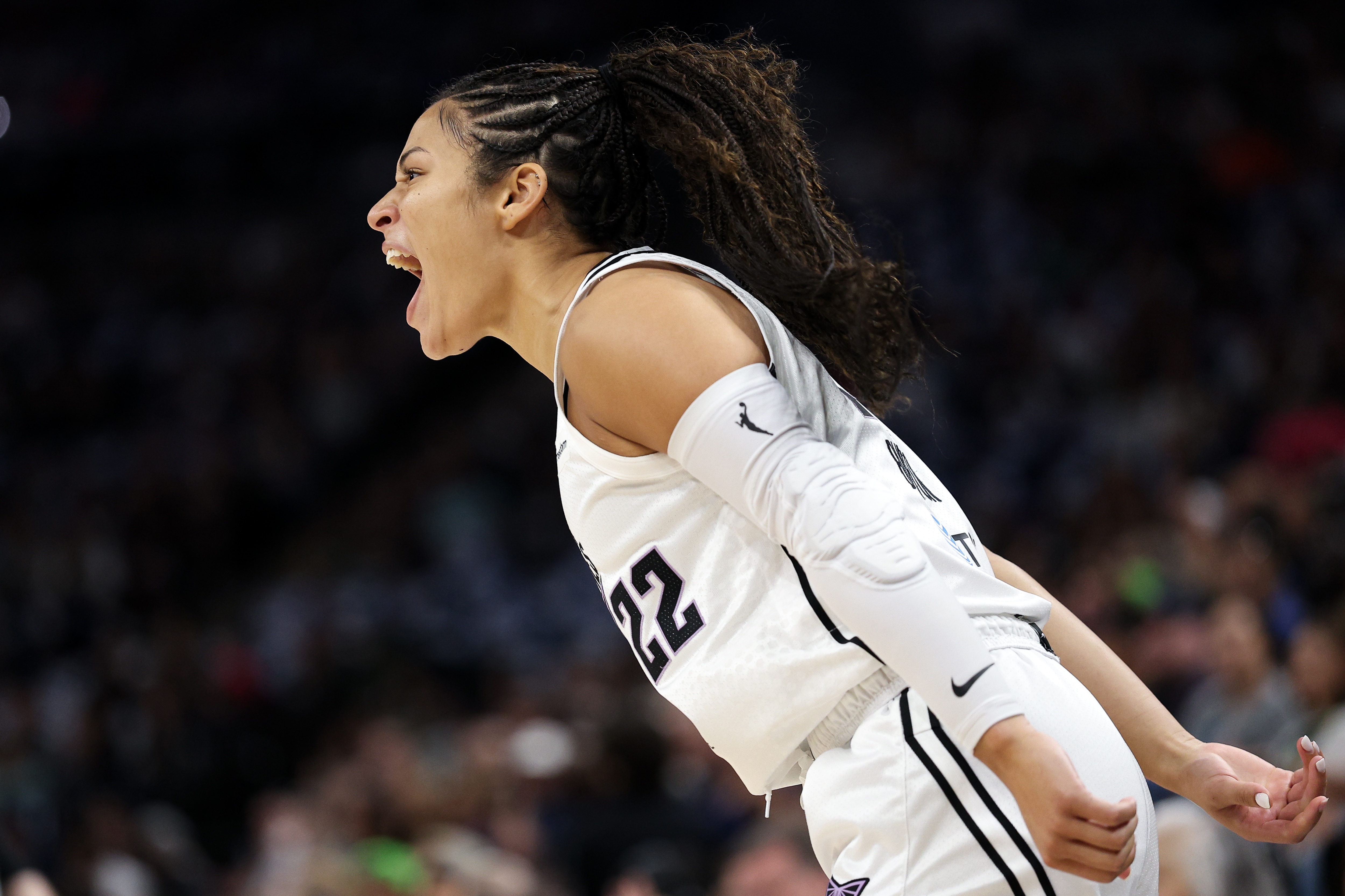 Veronica Burton #22 of the Golden State Valkyries celebrates her three point basket against the Minnesota Lynx