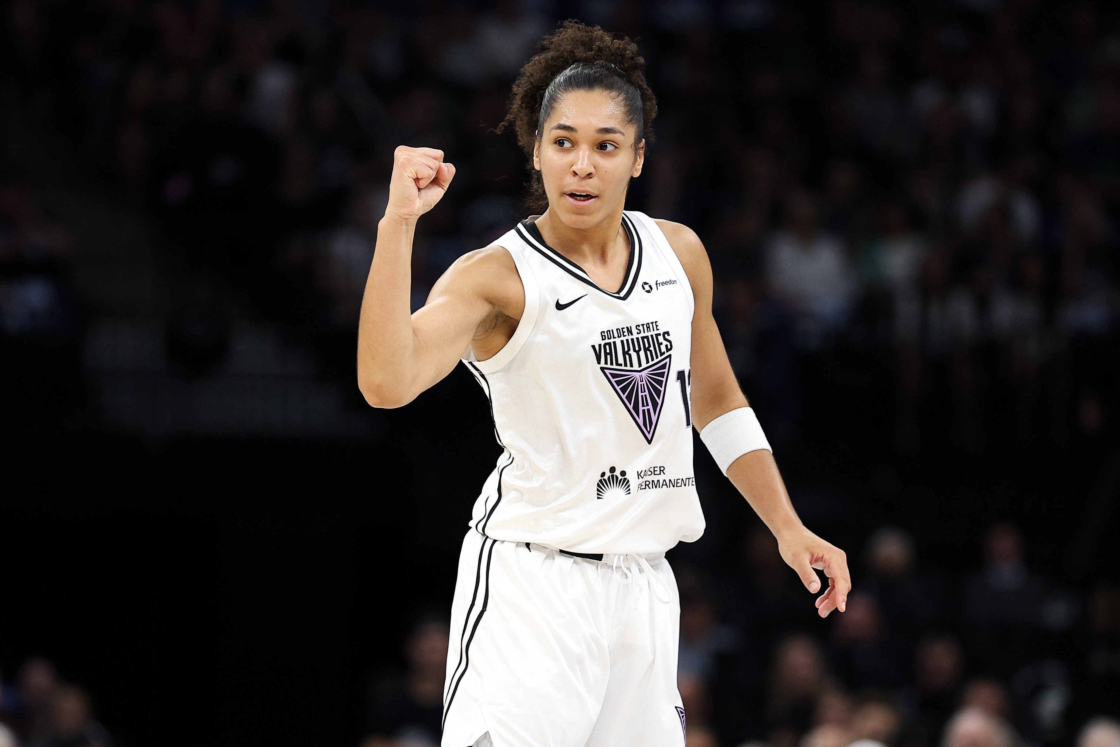 Janelle Salaun #13 of the Golden State Valkyries celebrates against the Minnesota Lynx
