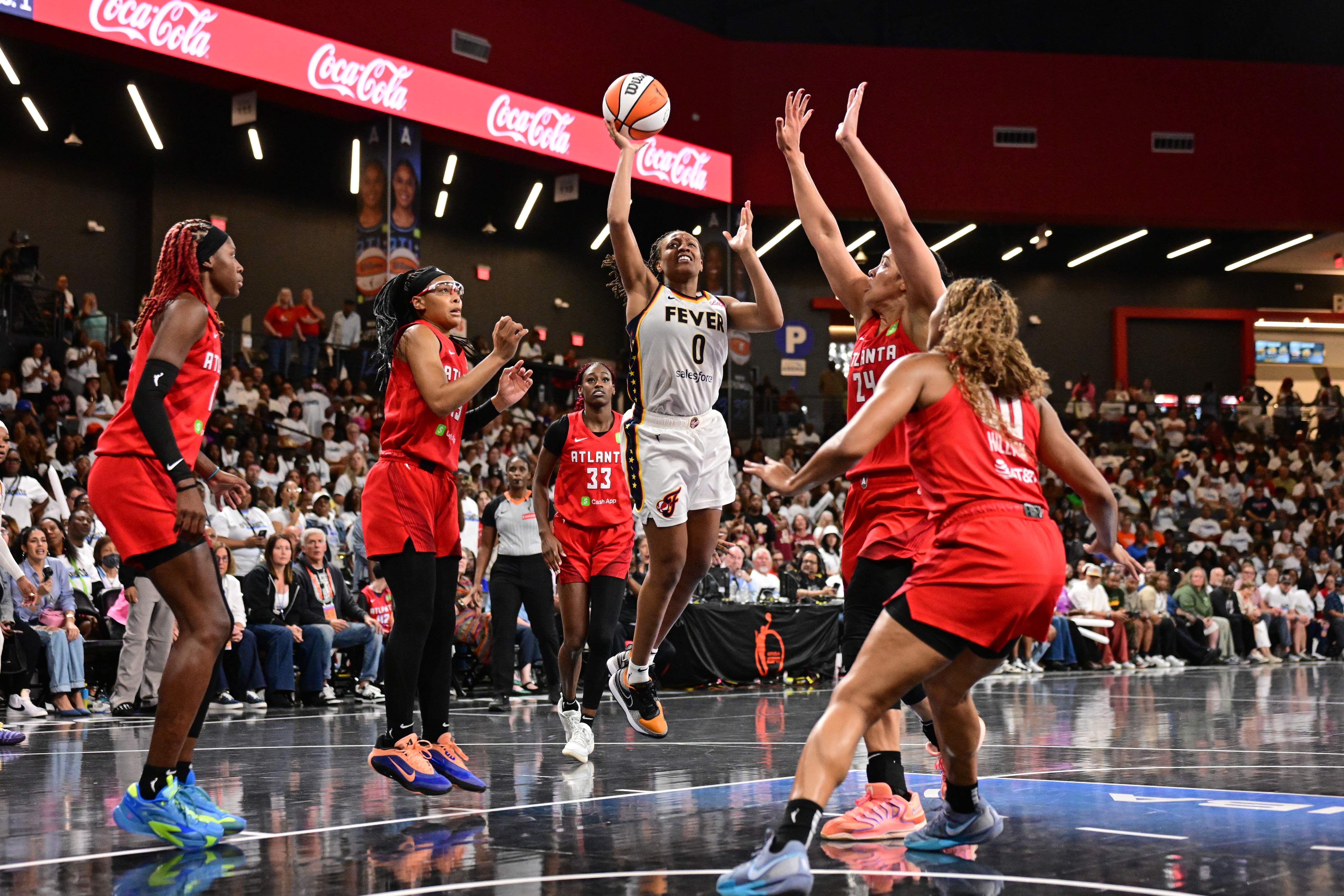 Kelsey Mitchell #0 of the Indiana Fever shoots the ball during the game against the Atlanta Dream