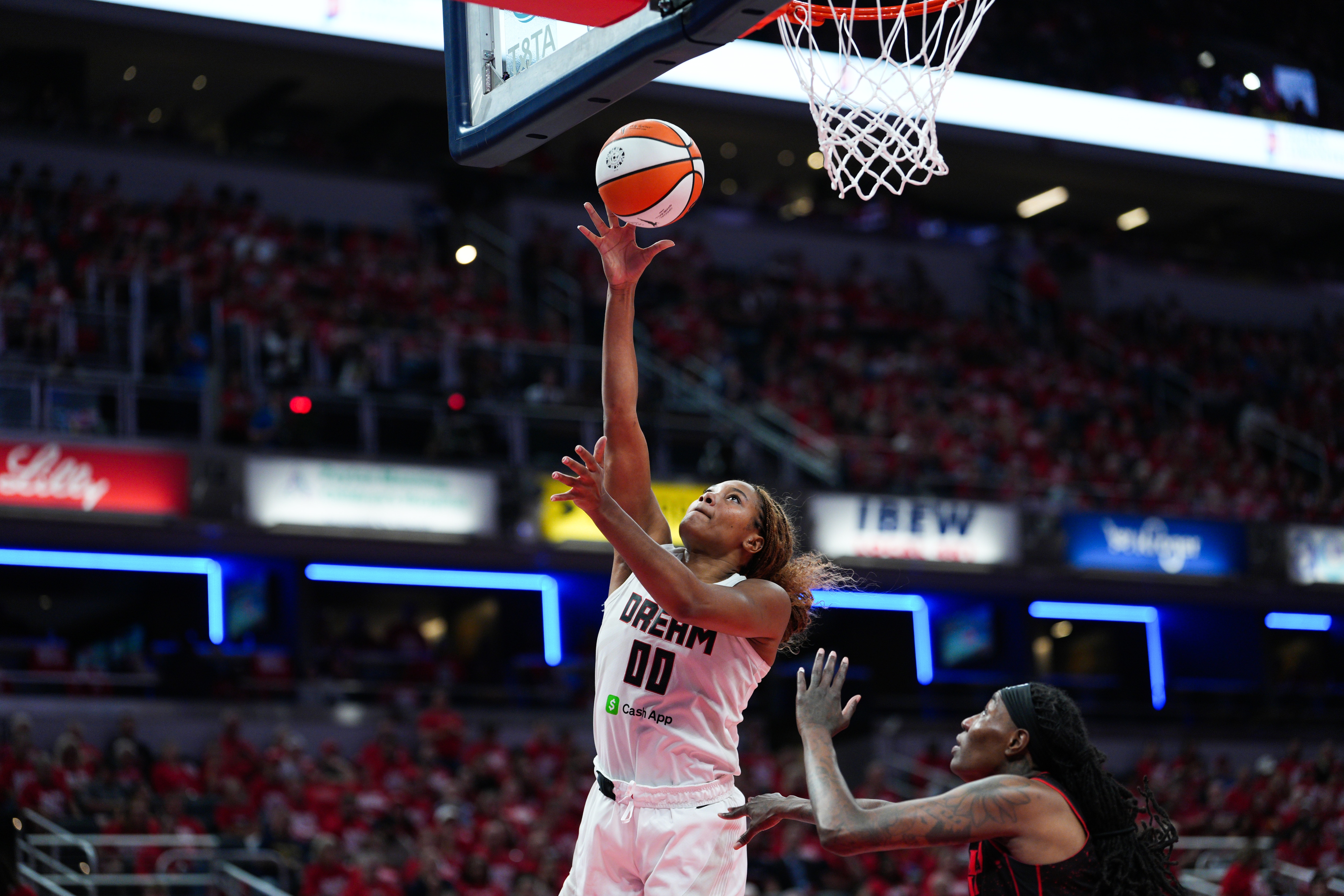 Naz Hillmon #00 of the Atlanta Dream attempts a shot vs. the Indiana Fever.
