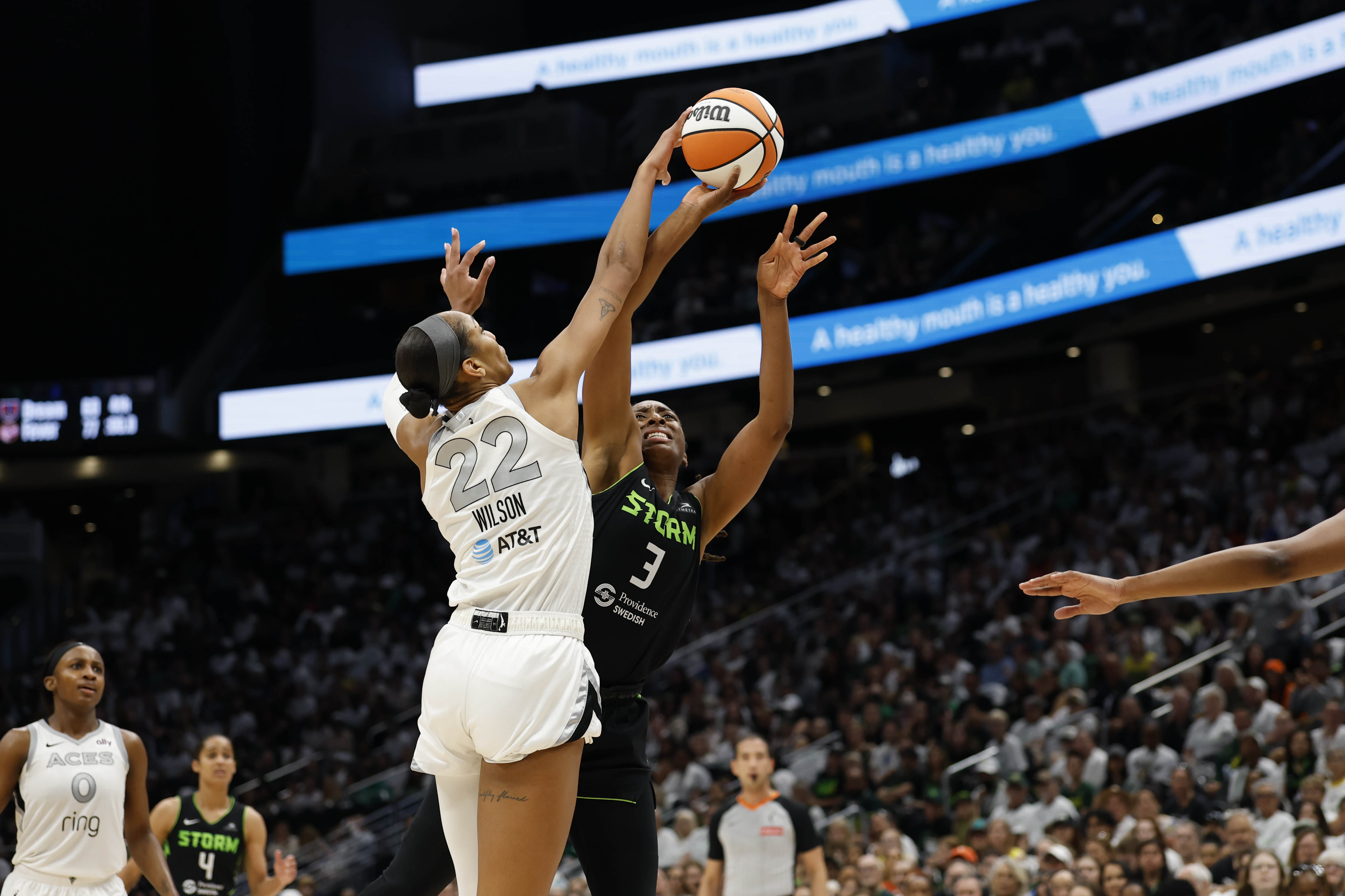 A'ja Wilson #22 of the Las Vegas Aces blocks a shot vs. the Seattle Storm.