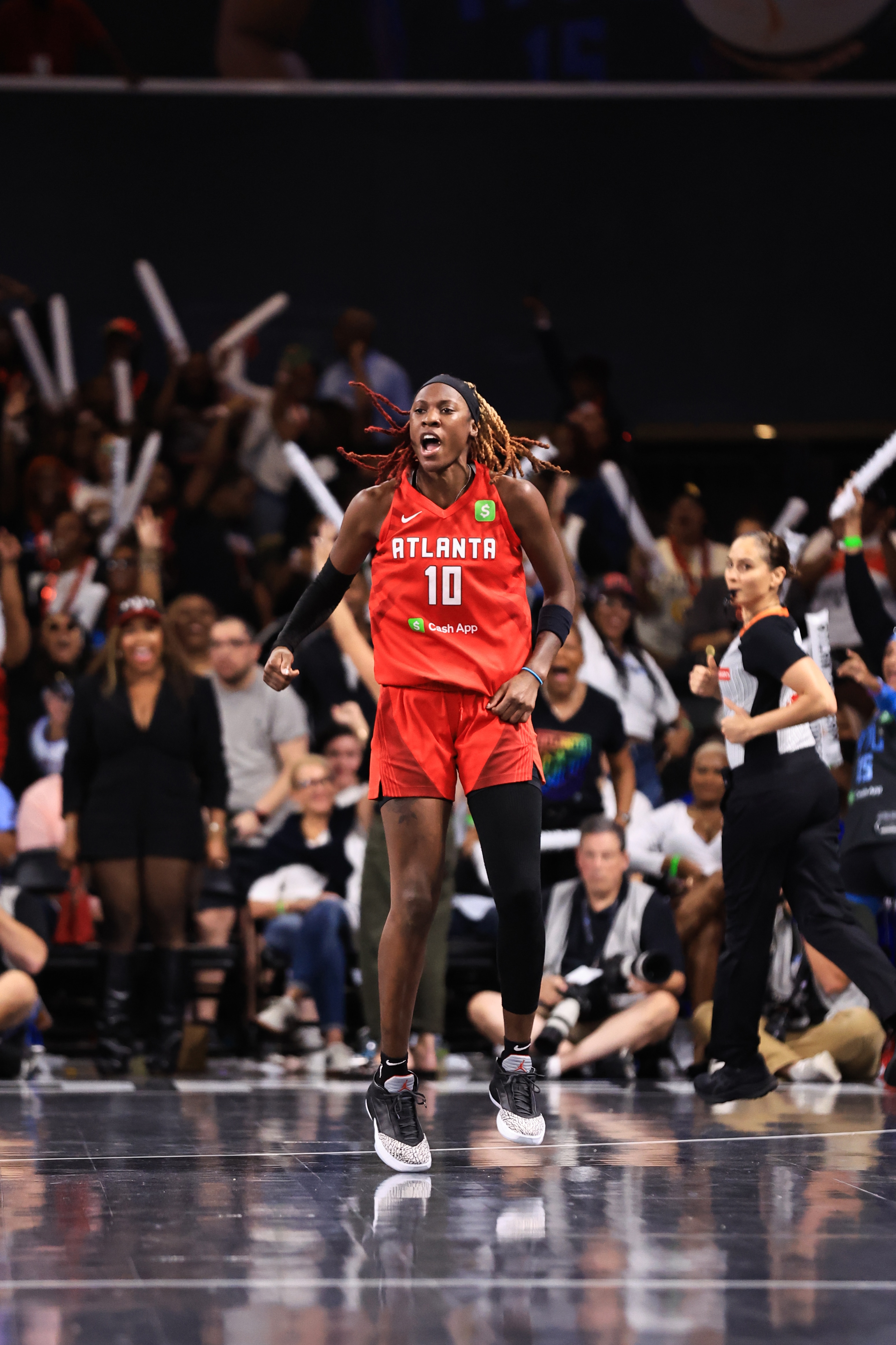 Rhyne Howard #10 of the Atlanta Dream celebrates during the game against the Indiana Fever