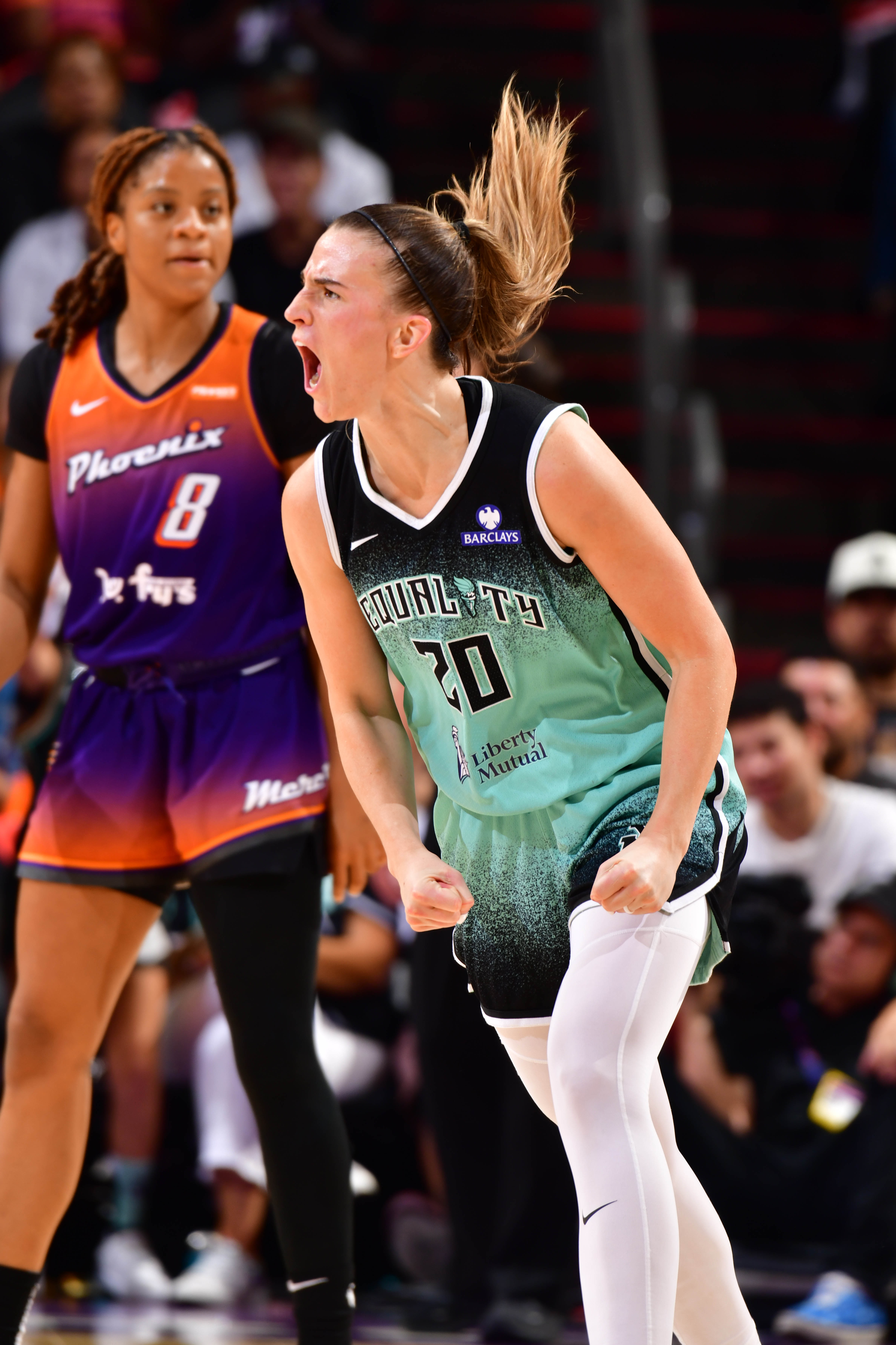Sabrina Ionescu #20 of the New York Liberty celebrates during the game against the Phoenix Mercury