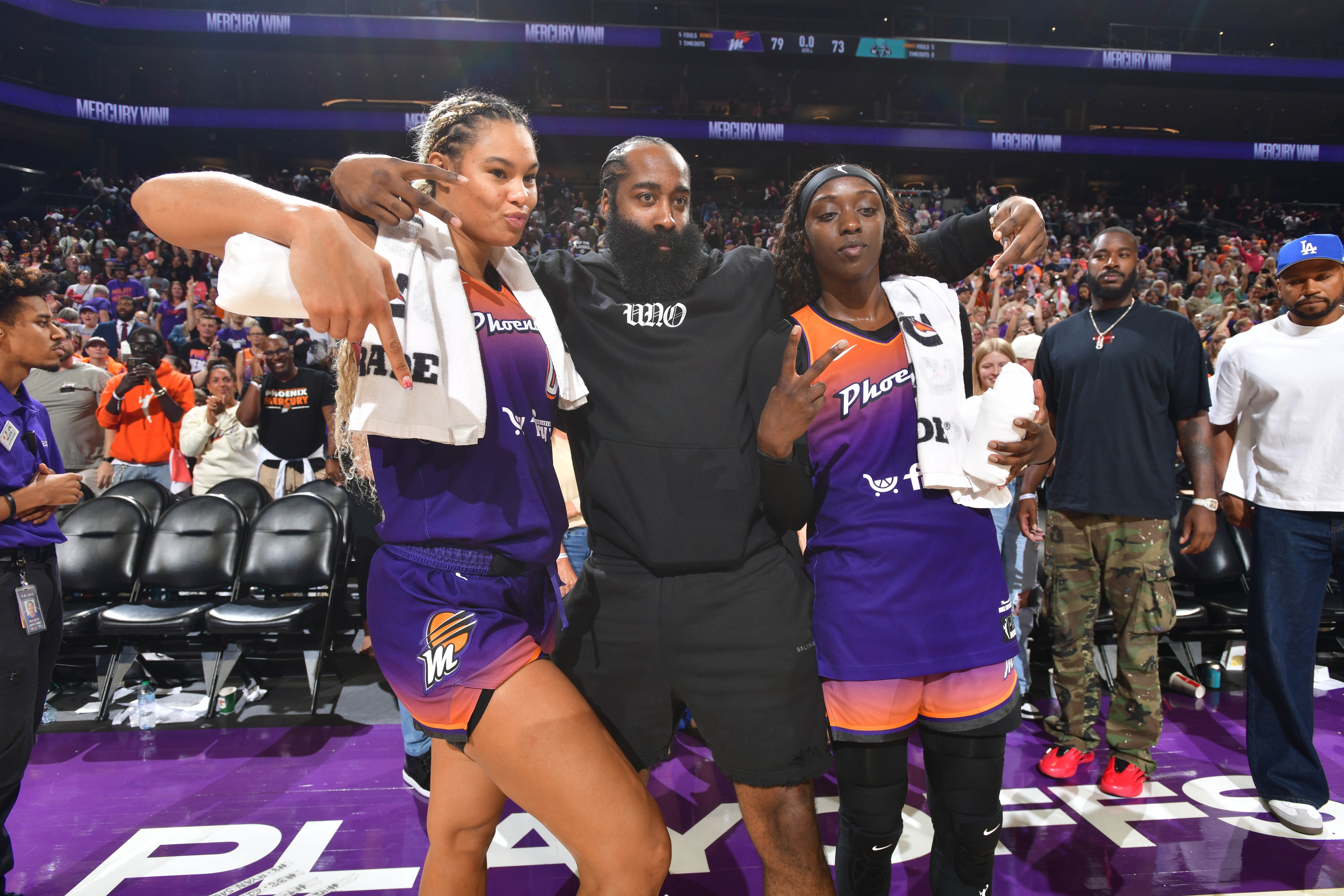 Satou Sabally #0, Kahleah Copper #2 of the Phoenix Mercury & James Harden #1 of the LA Clippers pose for a photo after the game