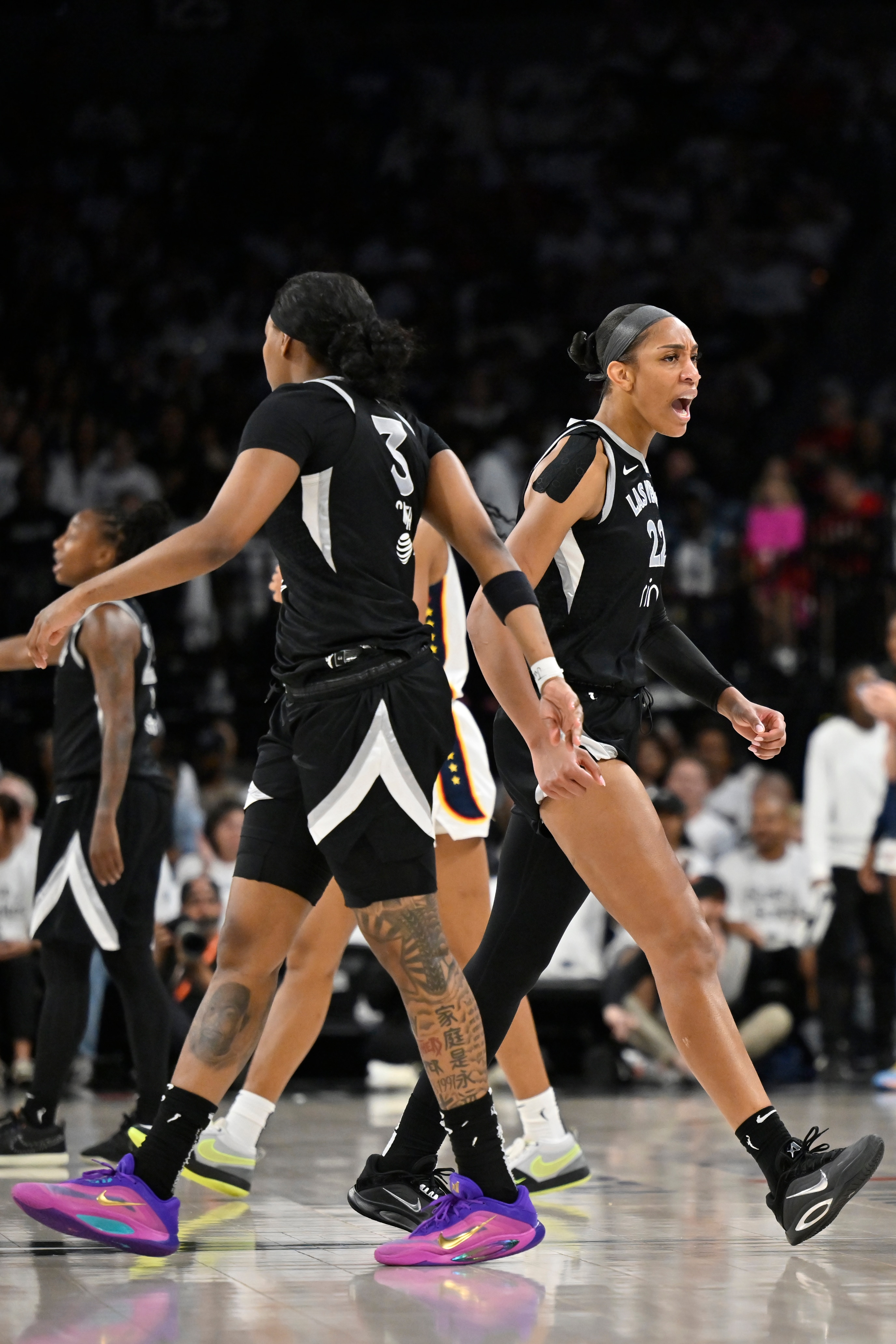 A'ja Wilson #22 and NaLyssa Smith #3 of the Las Vegas Aces high five during the game against the Indiana Fever