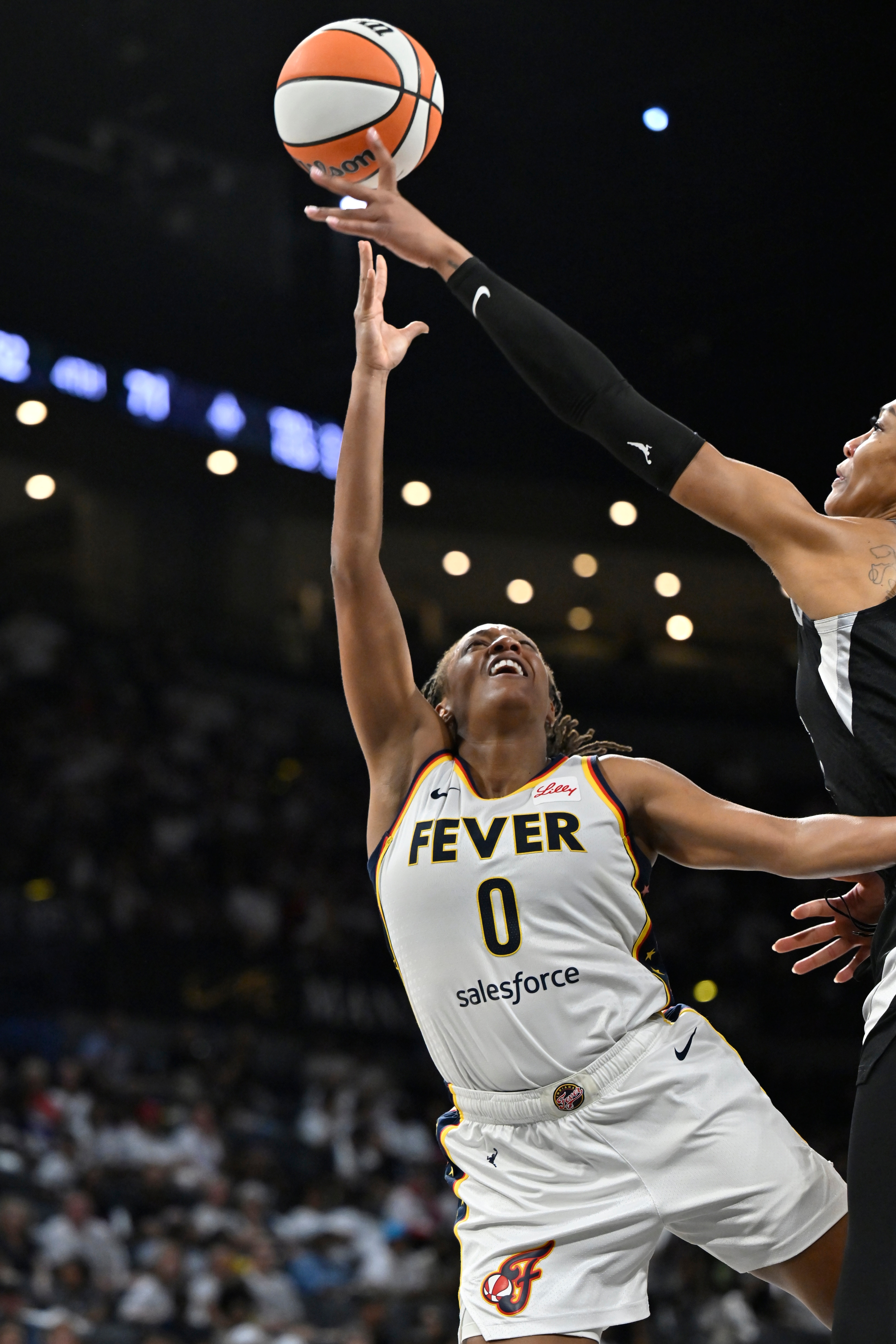 Kelsey Mitchell #0 of the Indiana Fever drives to the basket during the game against the Las Vegas Aces