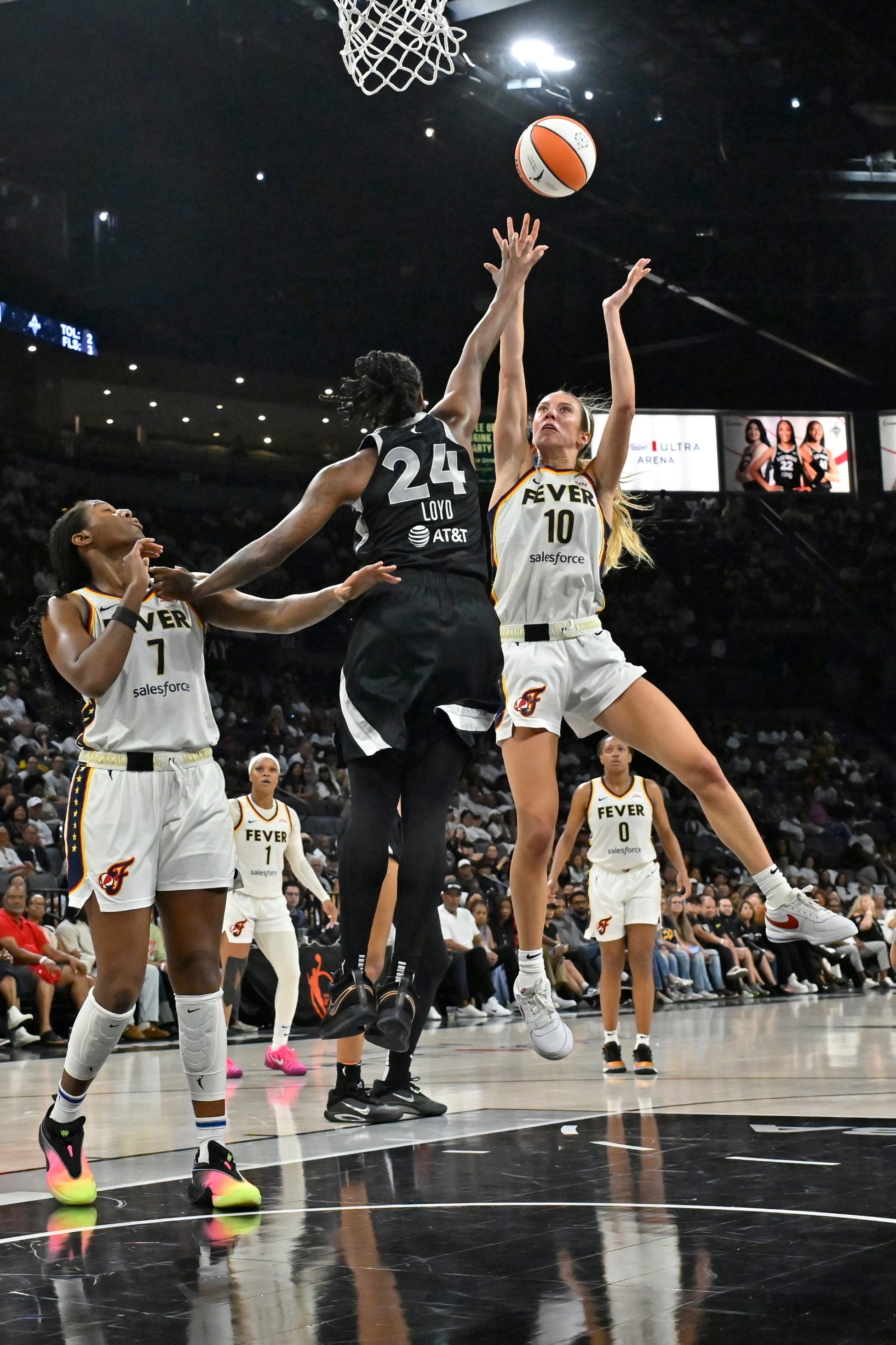 Lexie Hull #10 of the Indiana Fever drives to the basket during the game