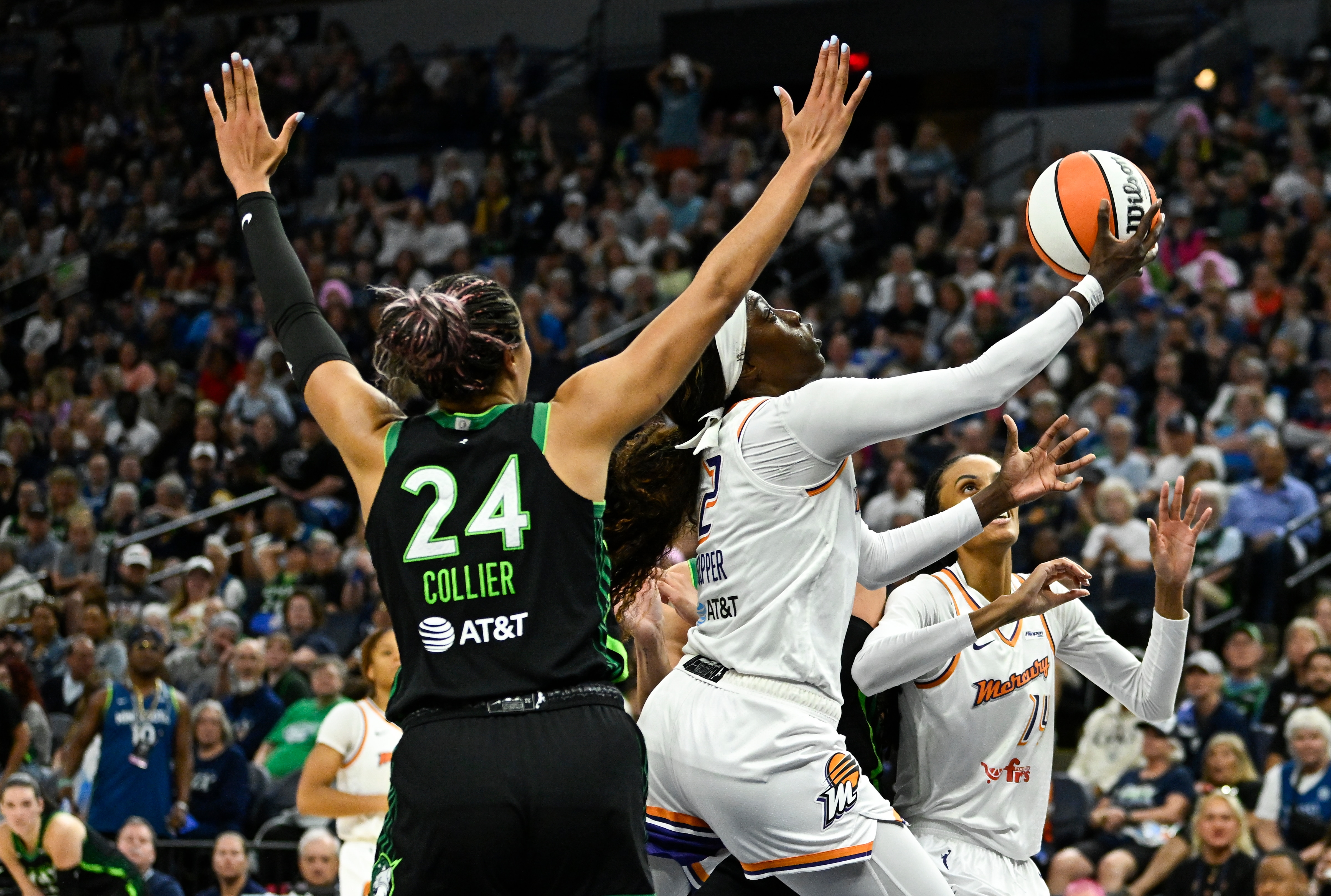 Kahleah Copper #2 of the Phoenix Mercury shoots the ball against Napheesa Collier #24 of the Minnesota Lynx