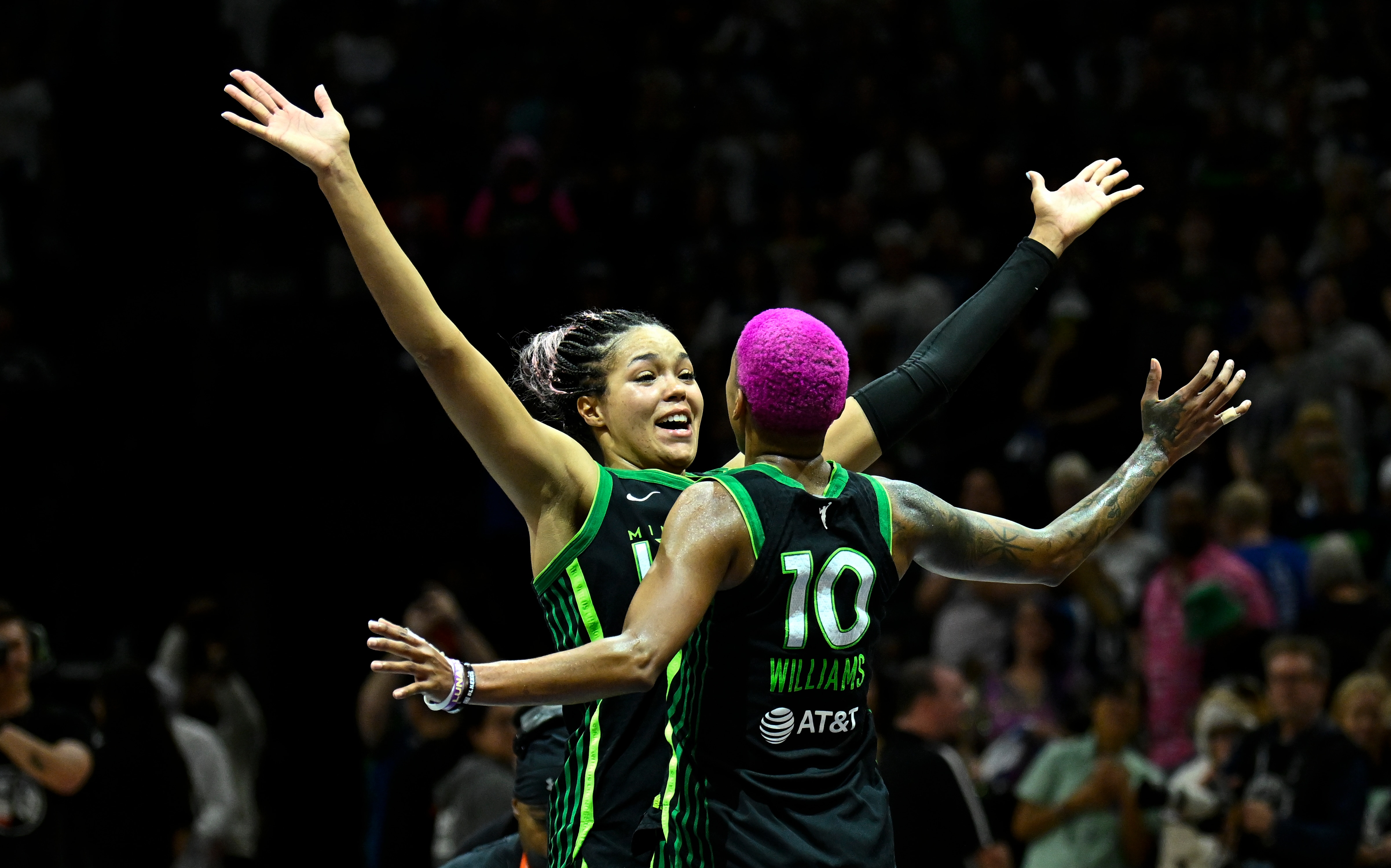 Napheesa Collier #24 and Courtney Williams #10 of the Minnesota Lynx celebrate