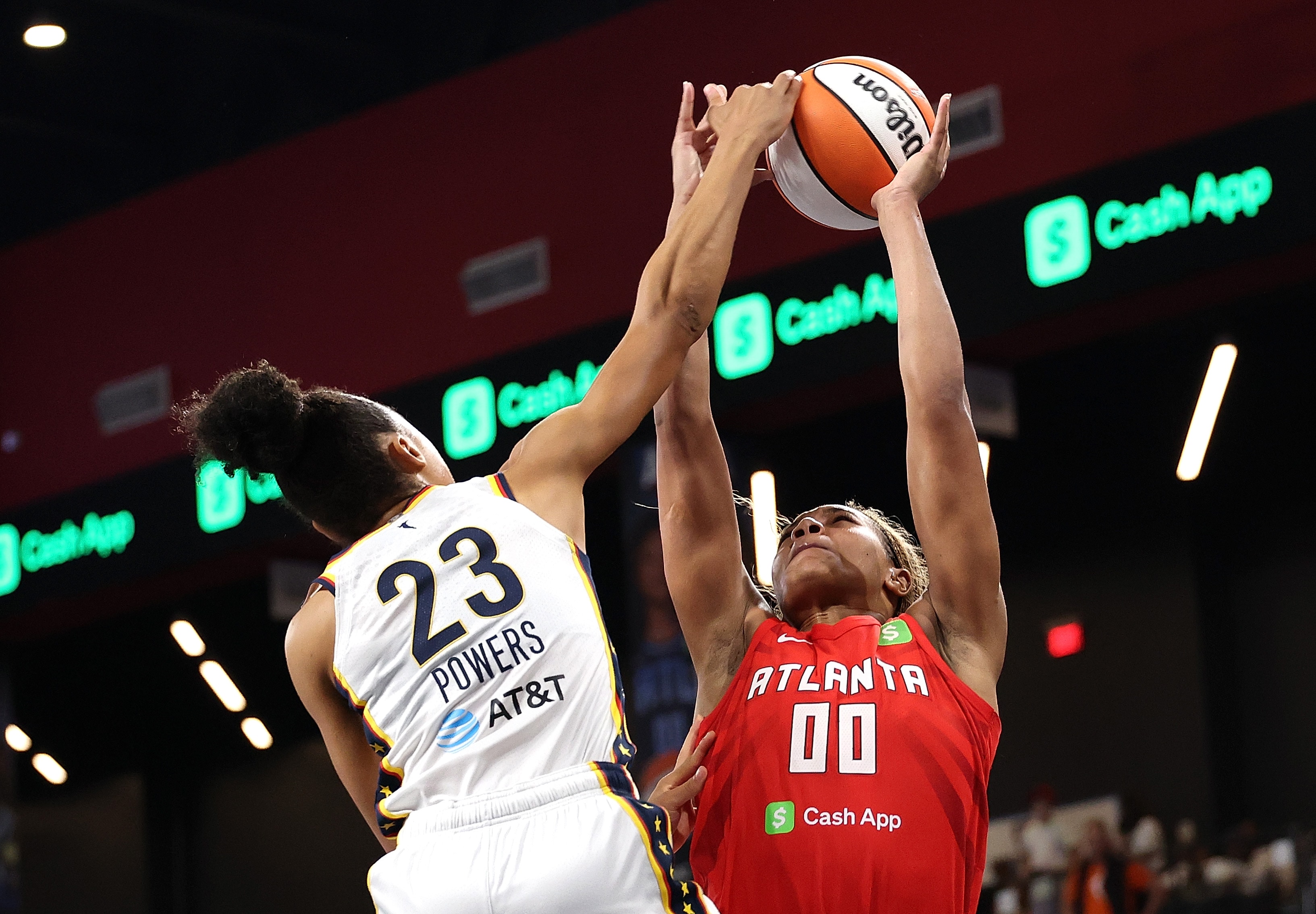 Naz Hillmon #00 of the Atlanta Dream has this shot blocked by Aerial Powers #23 of the Indiana Fever