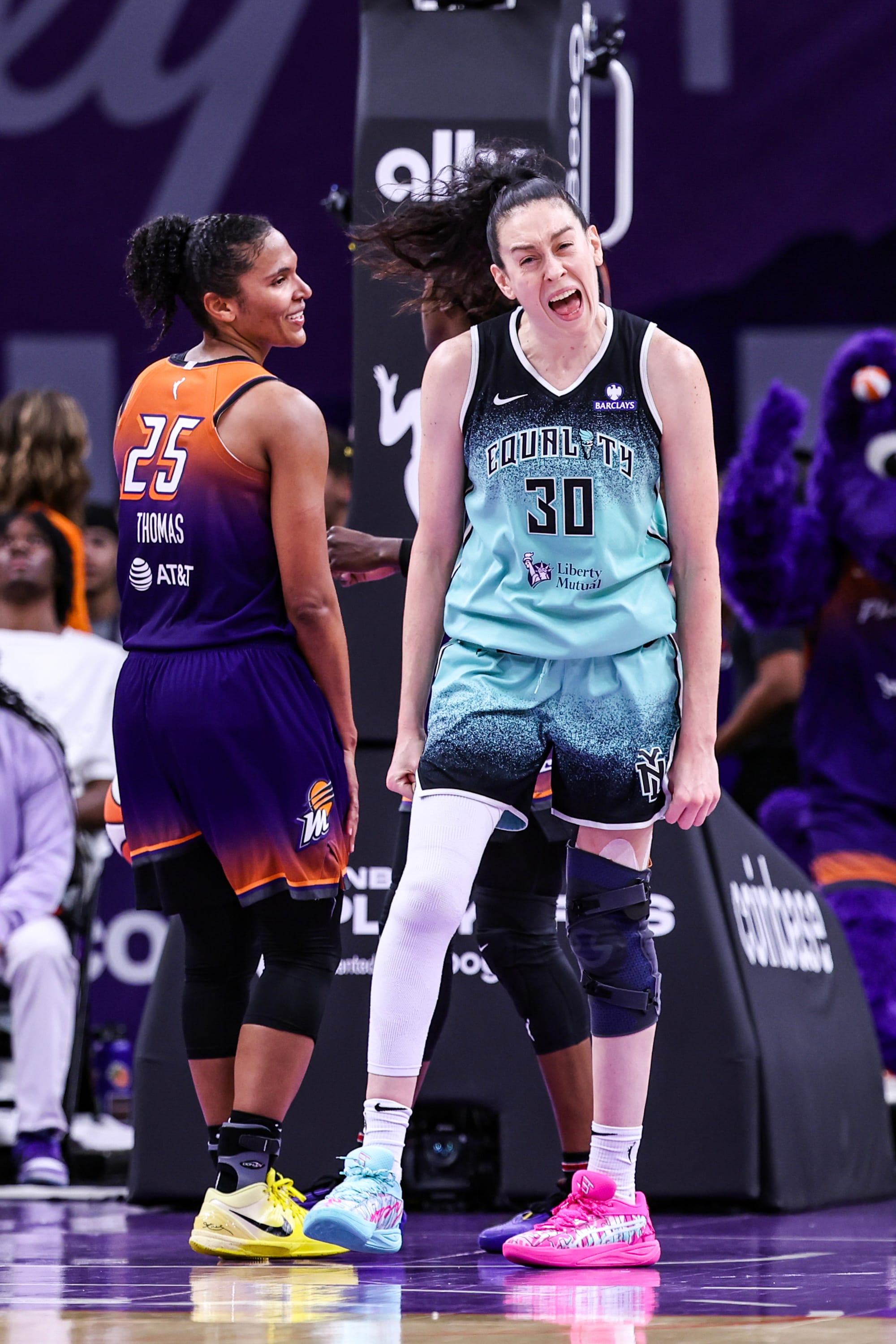 Breanna Stewart #30 of the New York Liberty celebrates while Alyssa Thomas #25 of the Phoenix Mercury watches