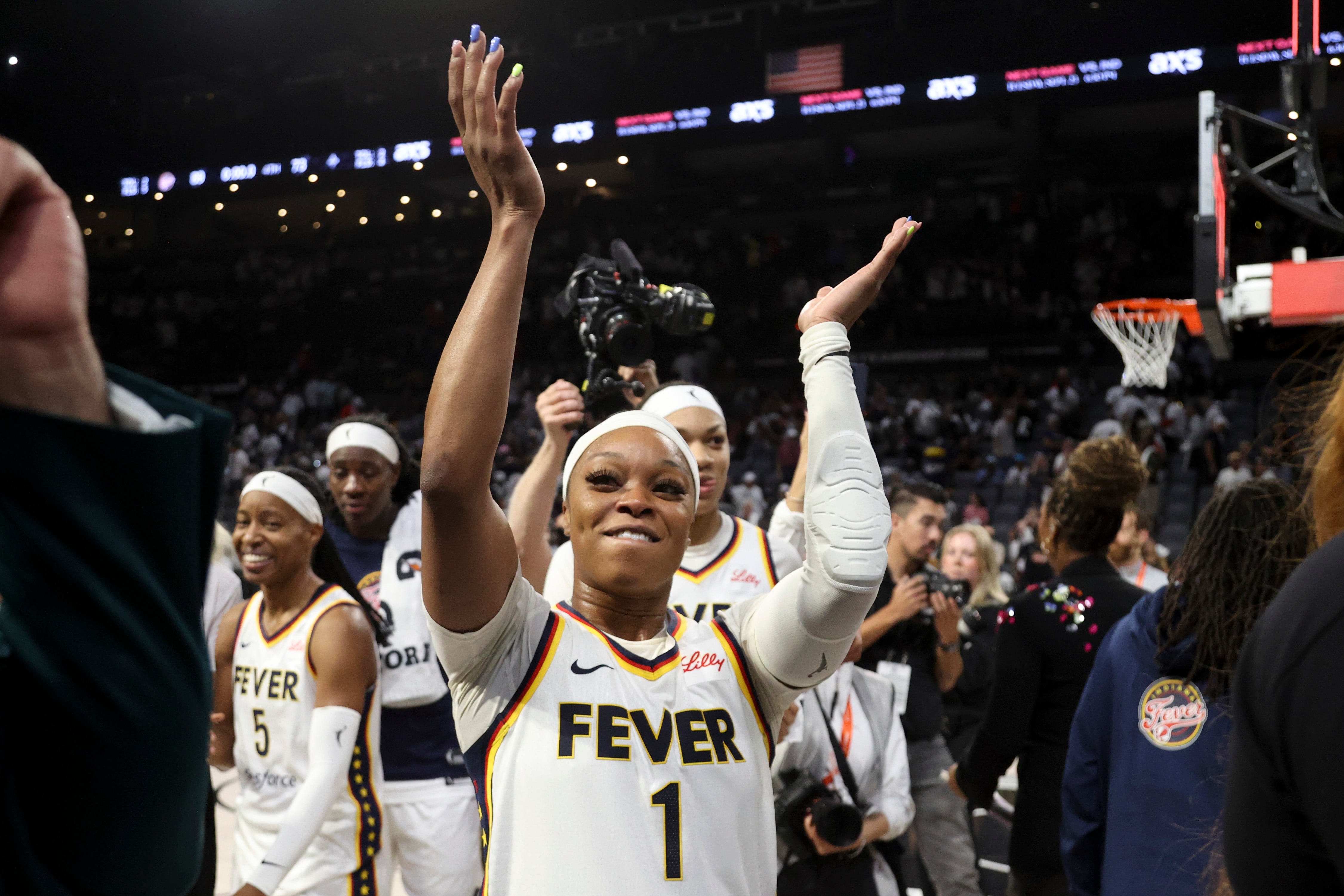 Odyssey Sims #1 of the Indiana Fever celebrates after her team's 89-73 victory against the Las Vegas Aces