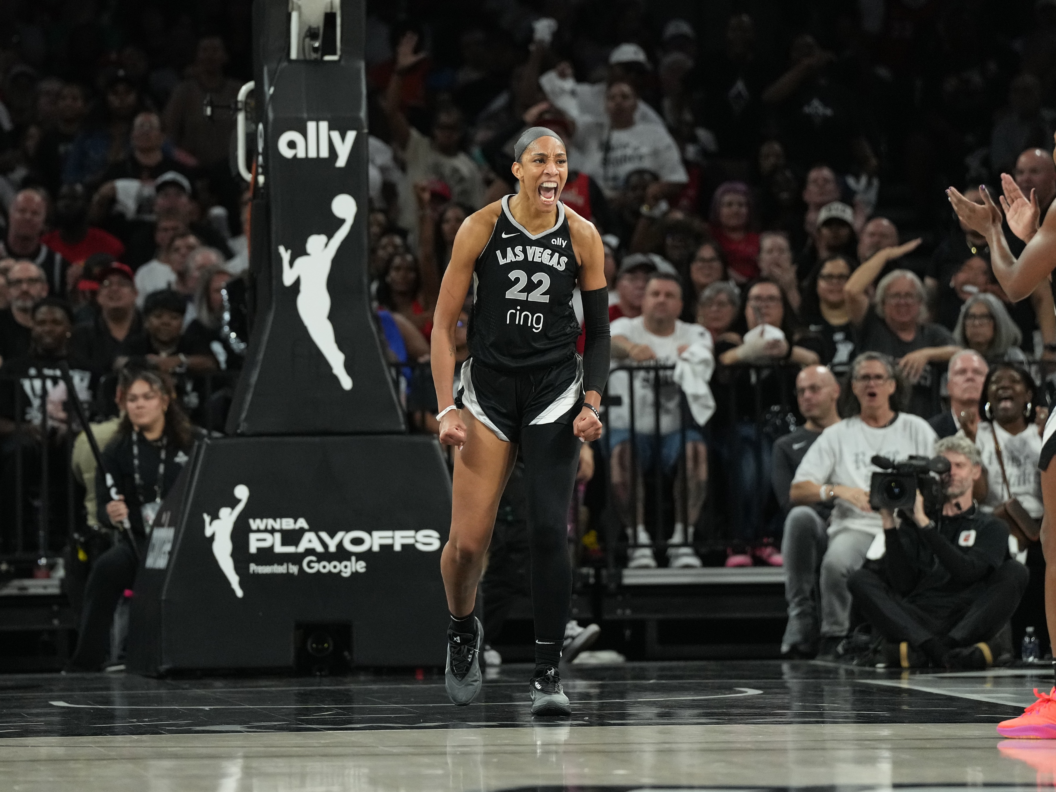 A'ja Wilson #22 of the Las Vegas Aces looks on during the game