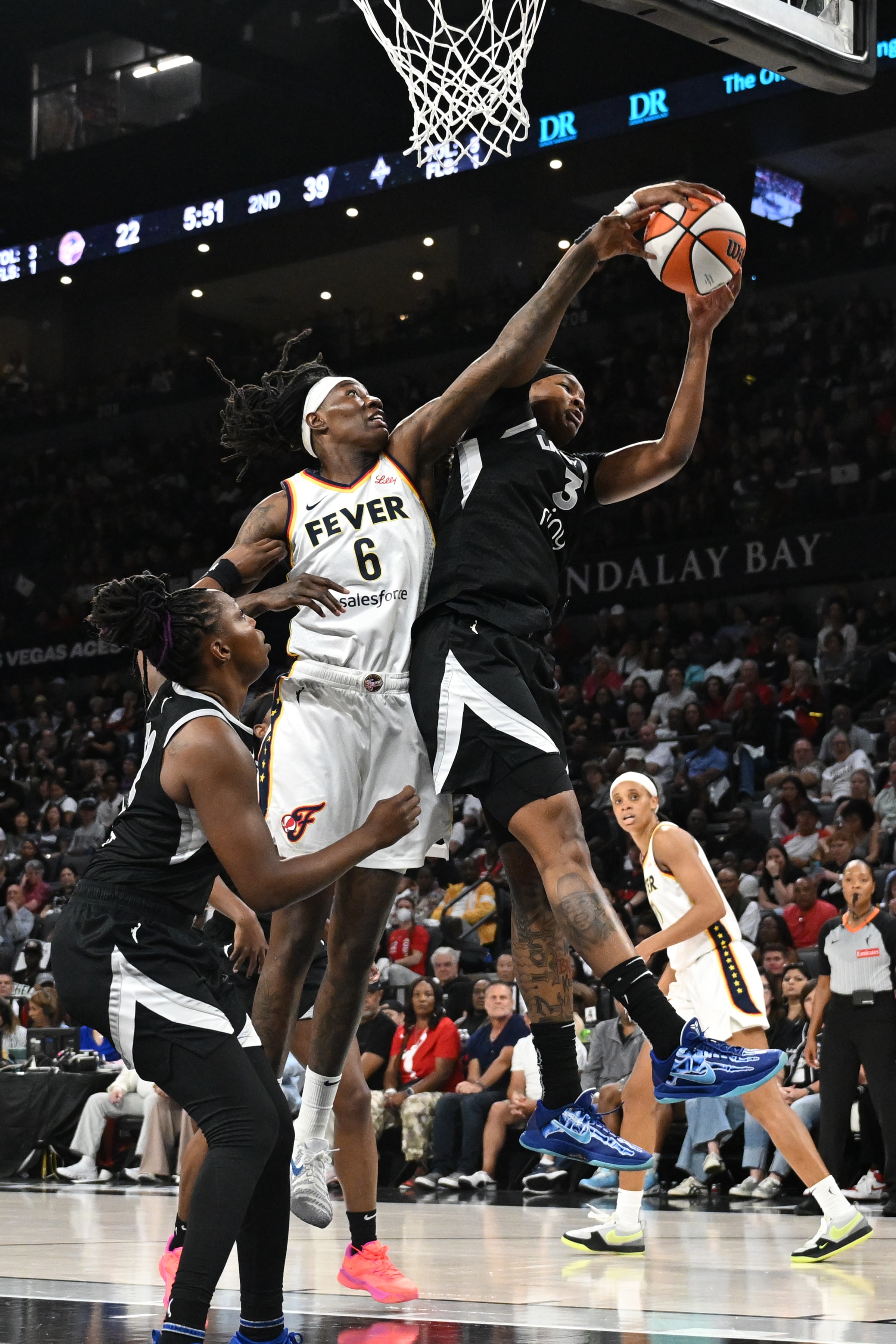 NaLyssa Smith #3 of the Las Vegas Aces grabs the rebound during the game against the Indiana Fever