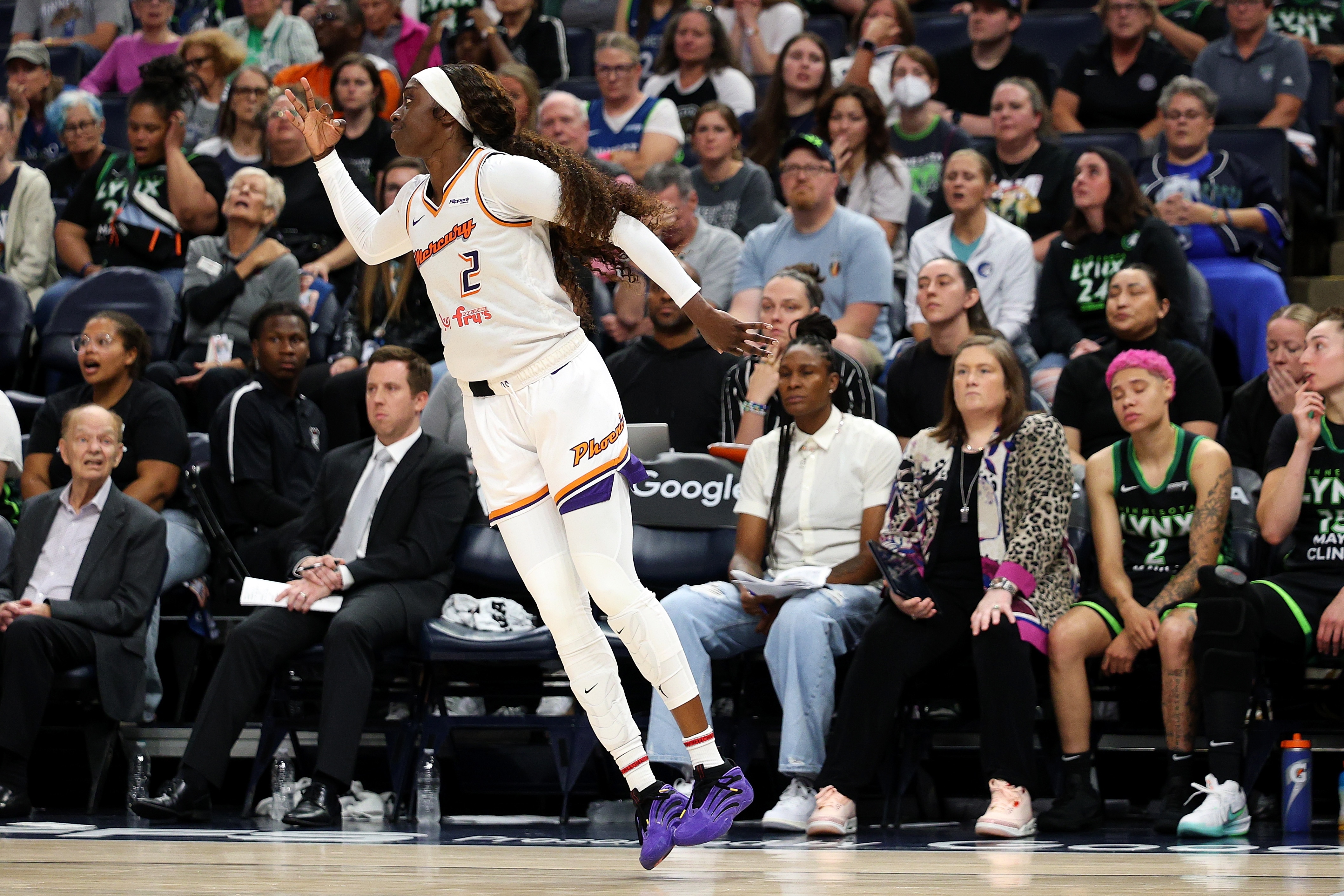 Kahleah Copper #2 of the Phoenix Mercury celebrates her three-point basket against the Minnesota Lynx