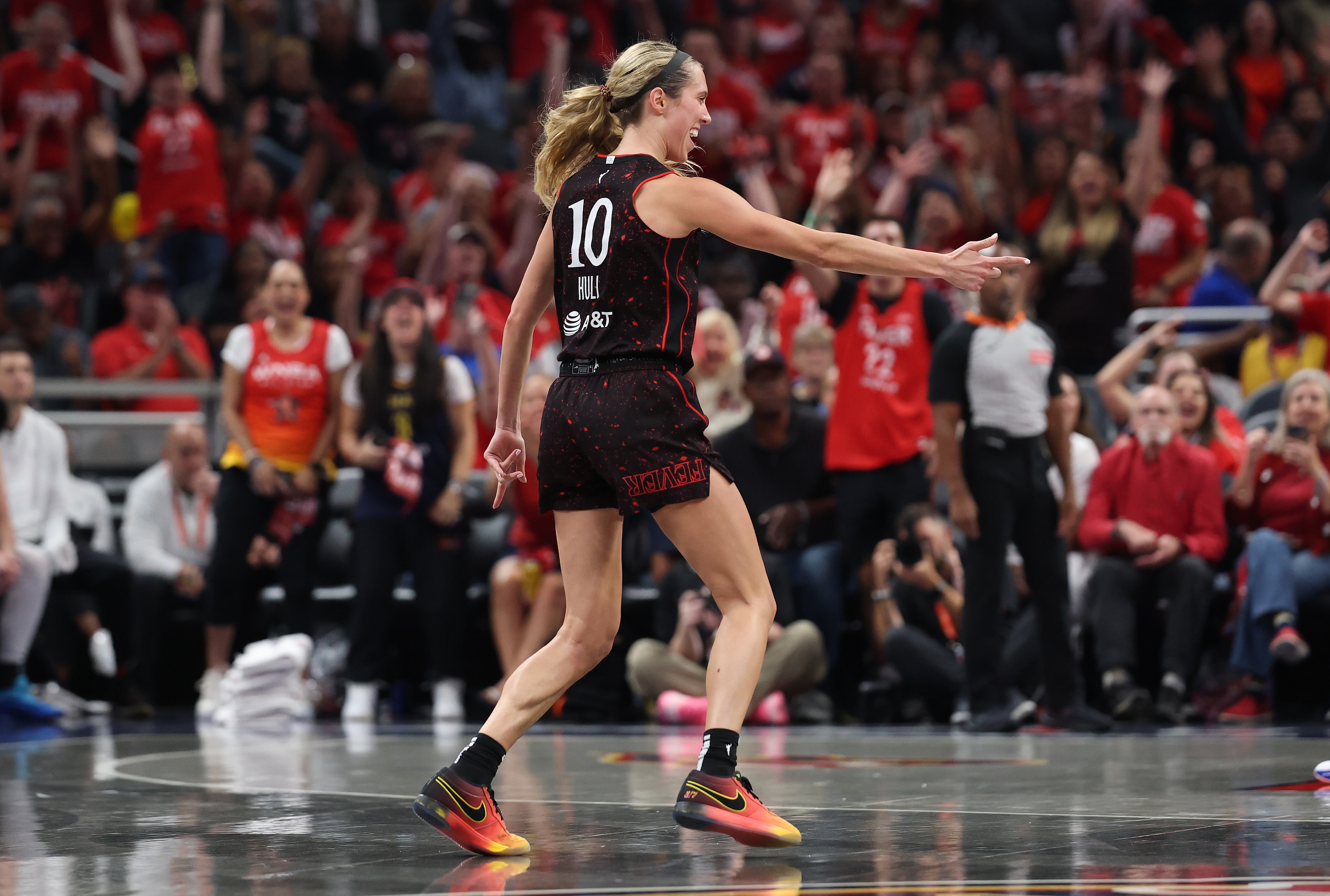 Lexie Hull #10 of the Indiana Fever celebrates a made three point shot during the game against the Las Vegas Aces