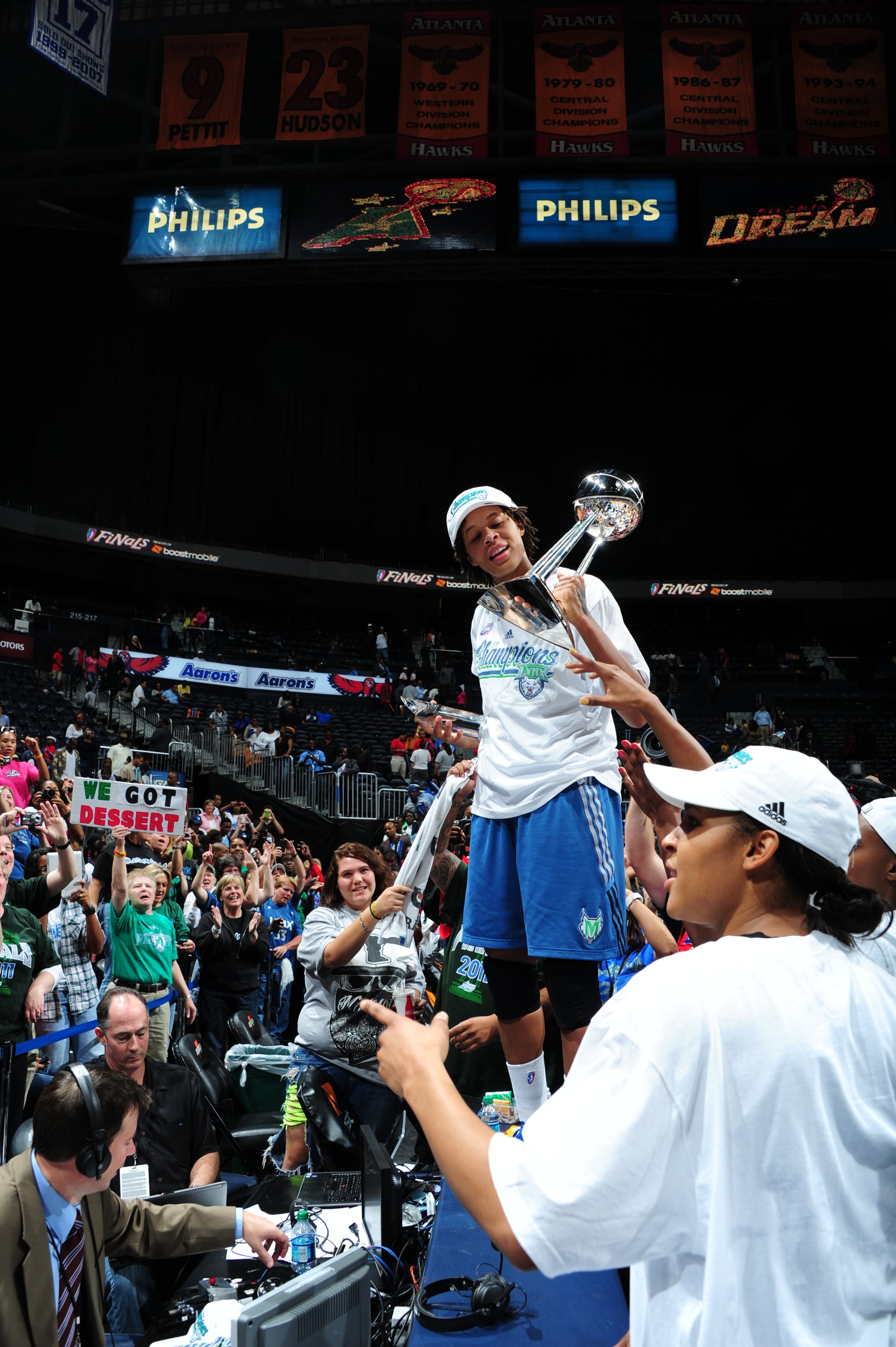 Seimone Augustus #33 of the Minnesota Lynx celebrates with the WNBA Trophy after the Lynx defeated the Atlanta Dream during Game Three of the 2011 WNBA Finals