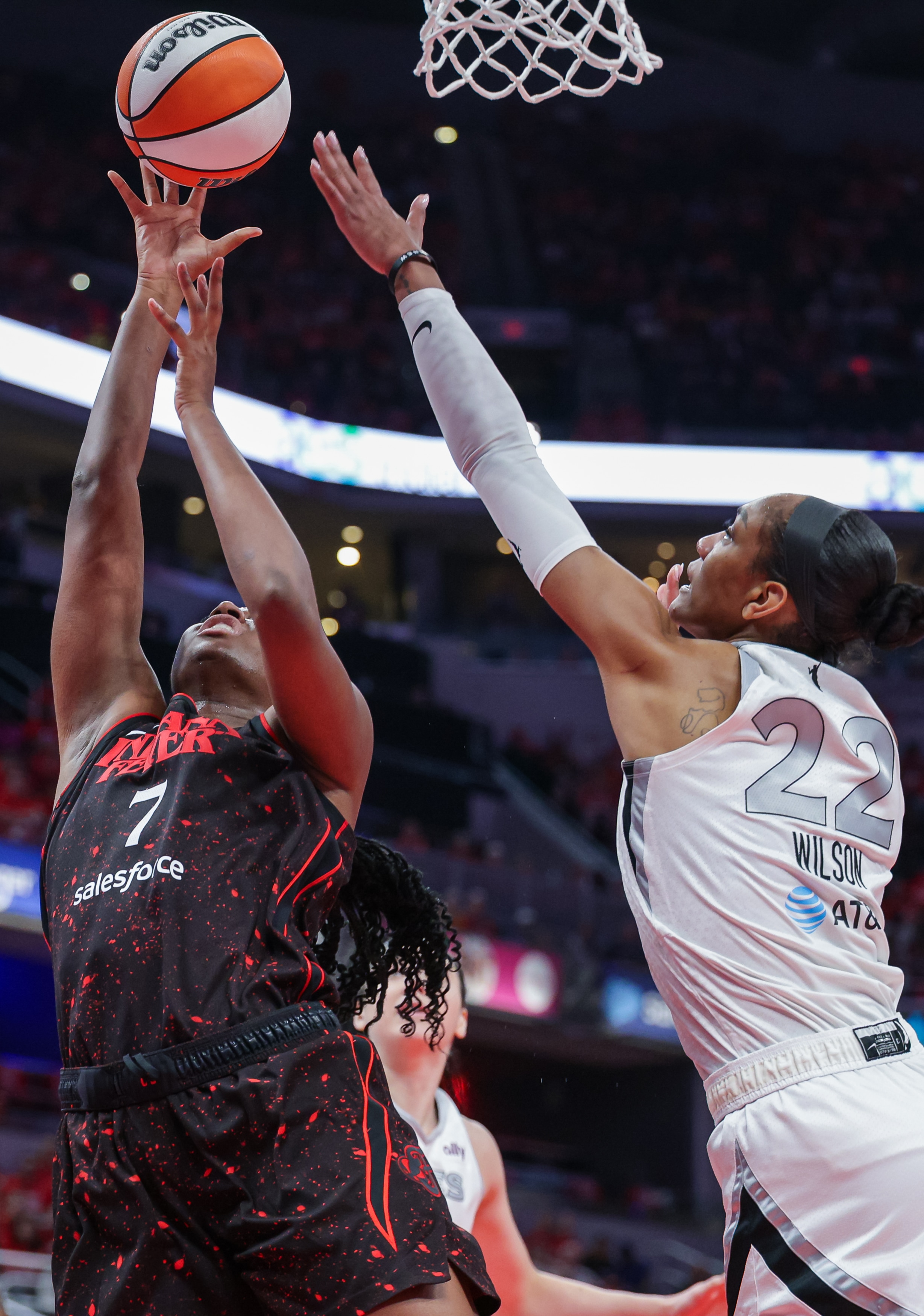 Aliyah Boston #7 of the Indiana Fever shoots the ball against A'ja Wilson #22 of the Las Vegas Aces