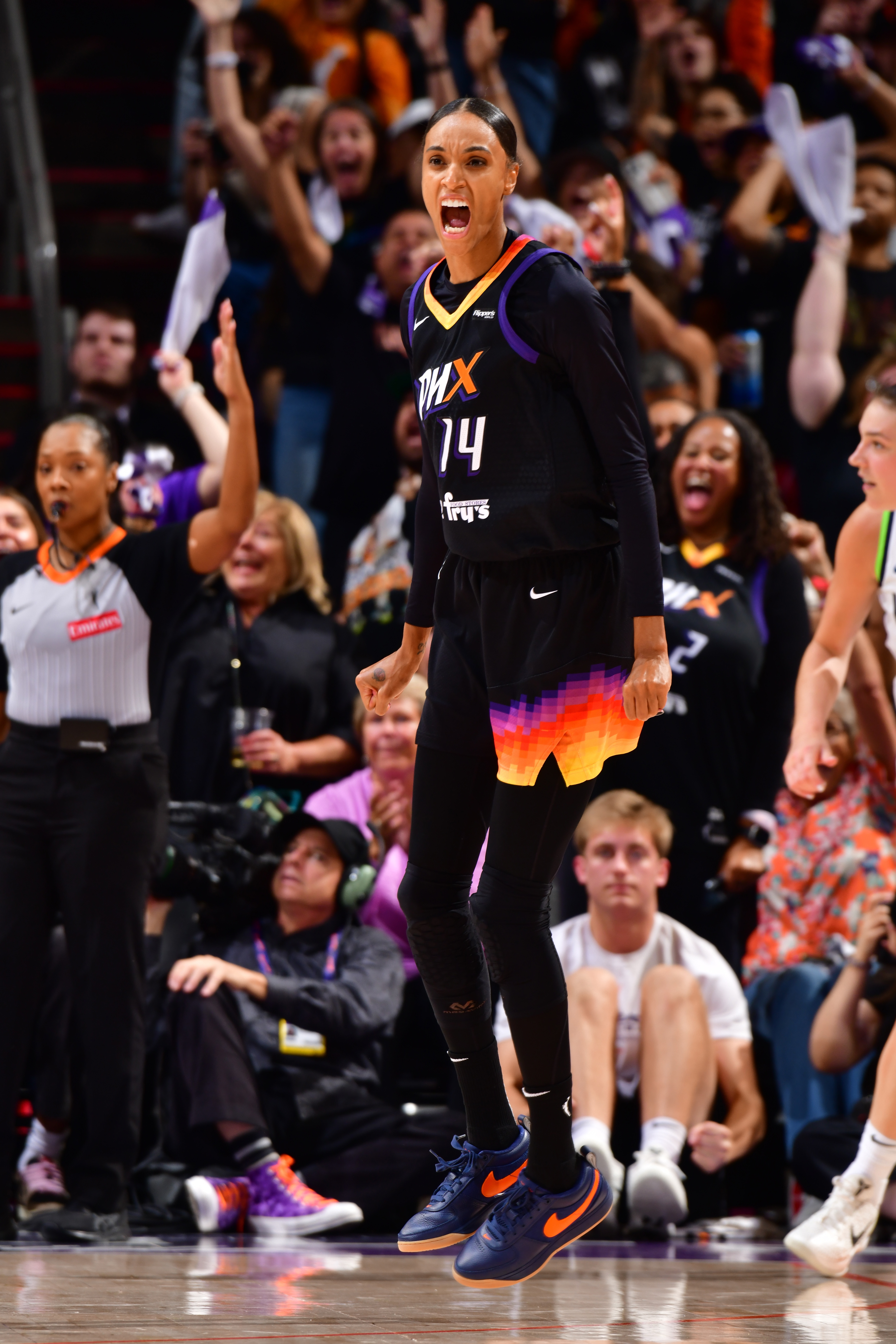 DeWanna Bonner #14 of the Phoenix Mercury celebrates during the game against the Minnesota Lynx