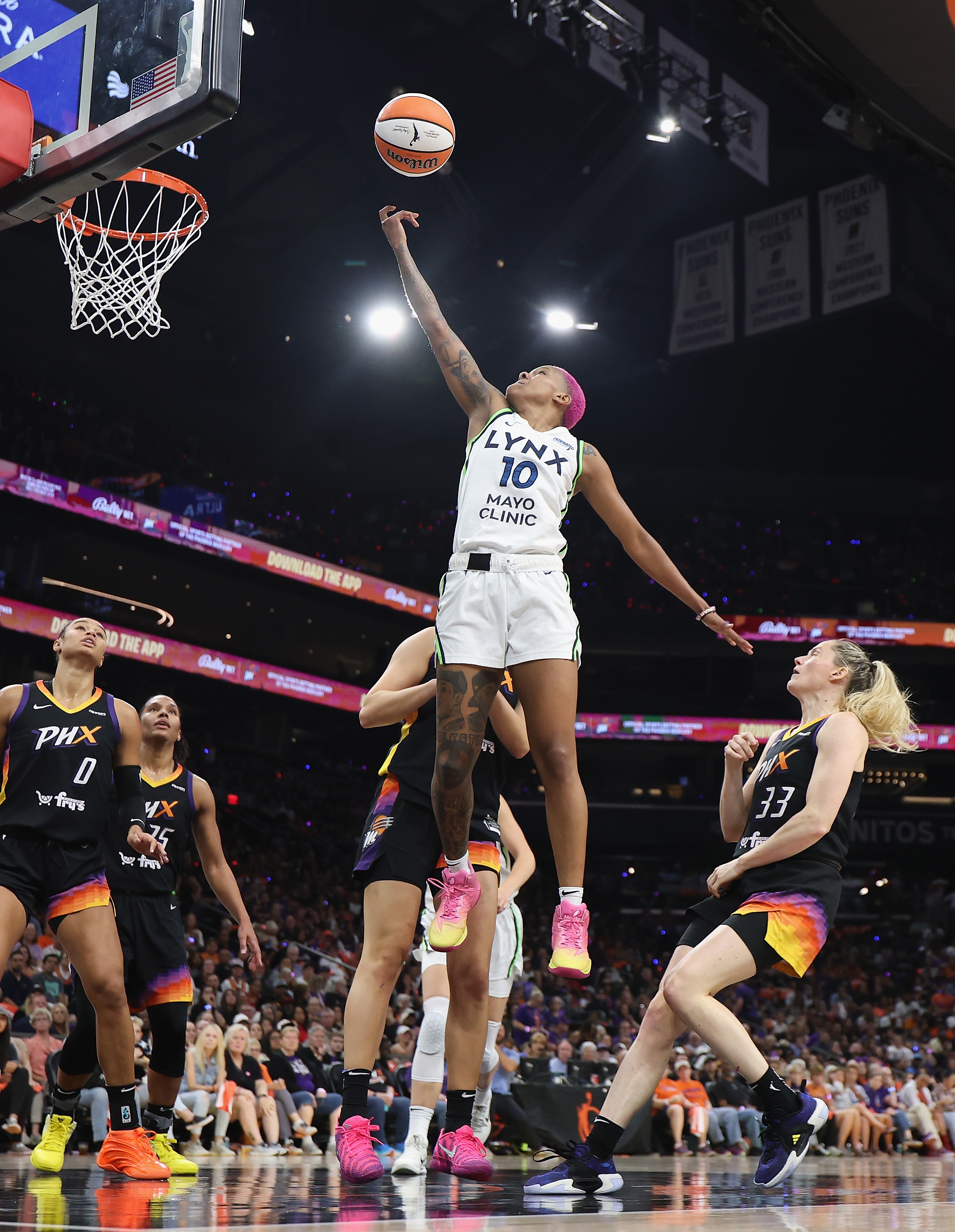 Courtney Williams #10 of the Minnesota Lynx puts up a shot against the Phoenix Mercury