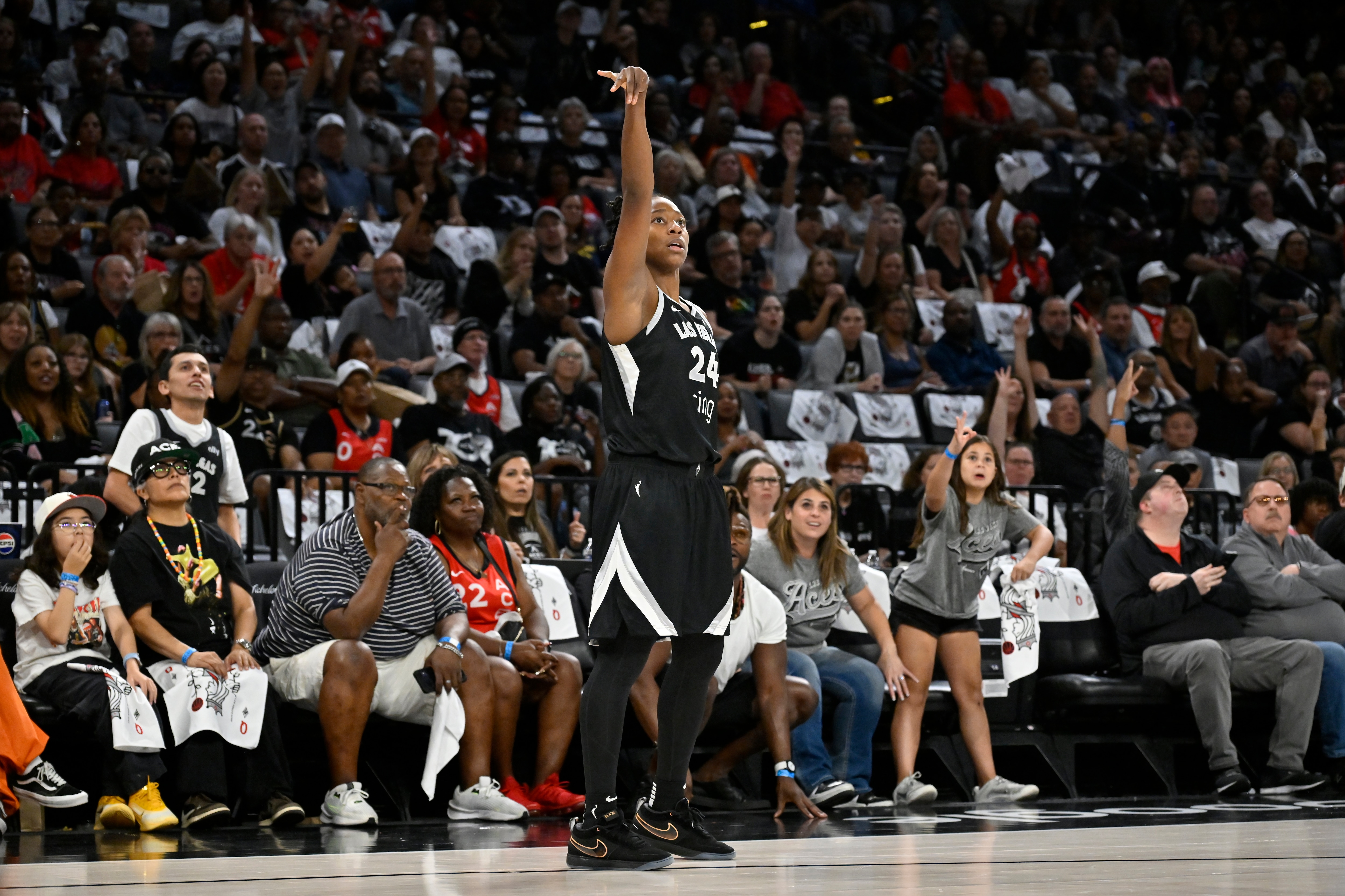 Jewell Loyd #24 of the Las Vegas Aces shoots a three point basket during the game against the Indiana Fever