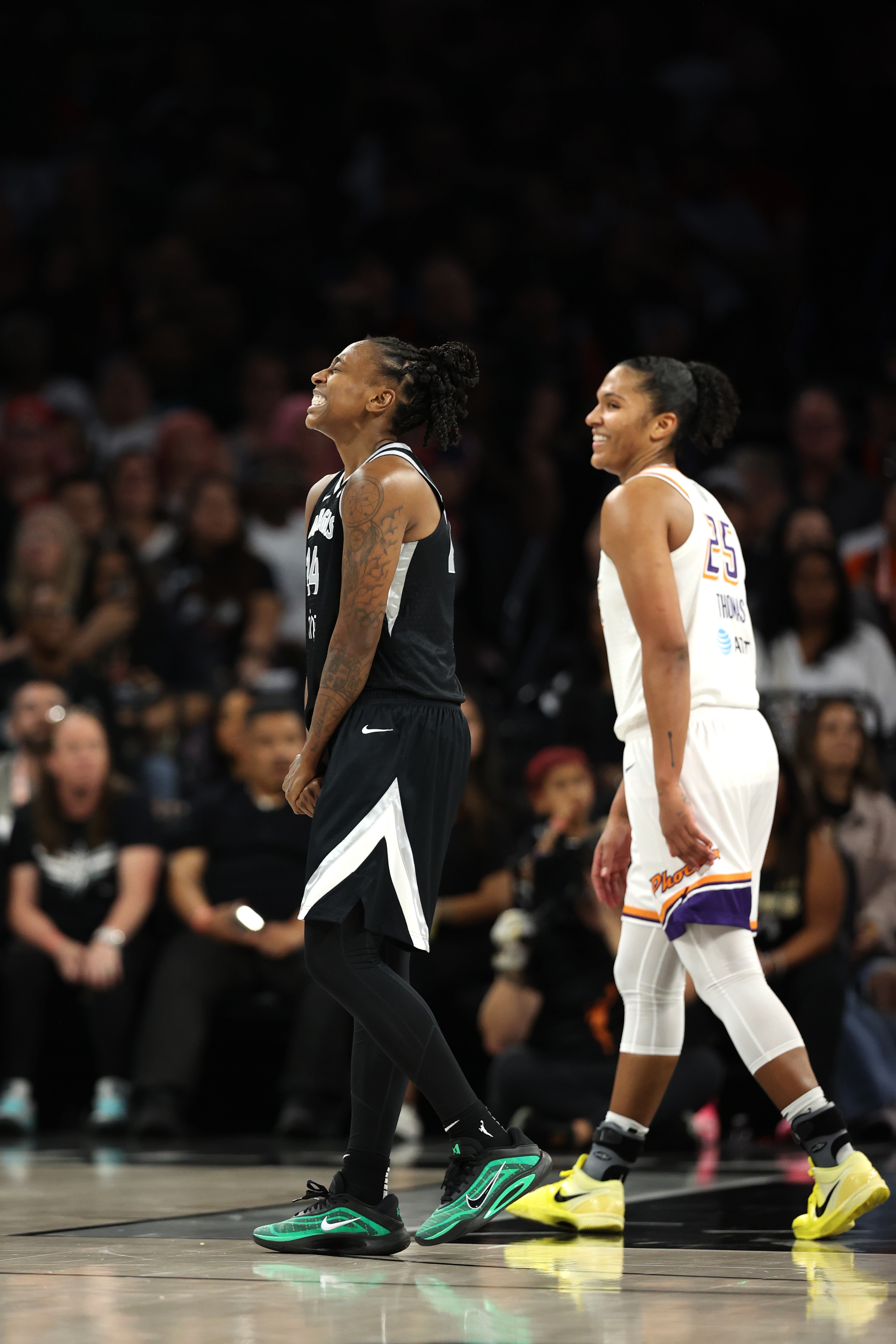 Jewell Loyd #24 of the Las Vegas Aces celebrates during the game against the Phoenix Mercury