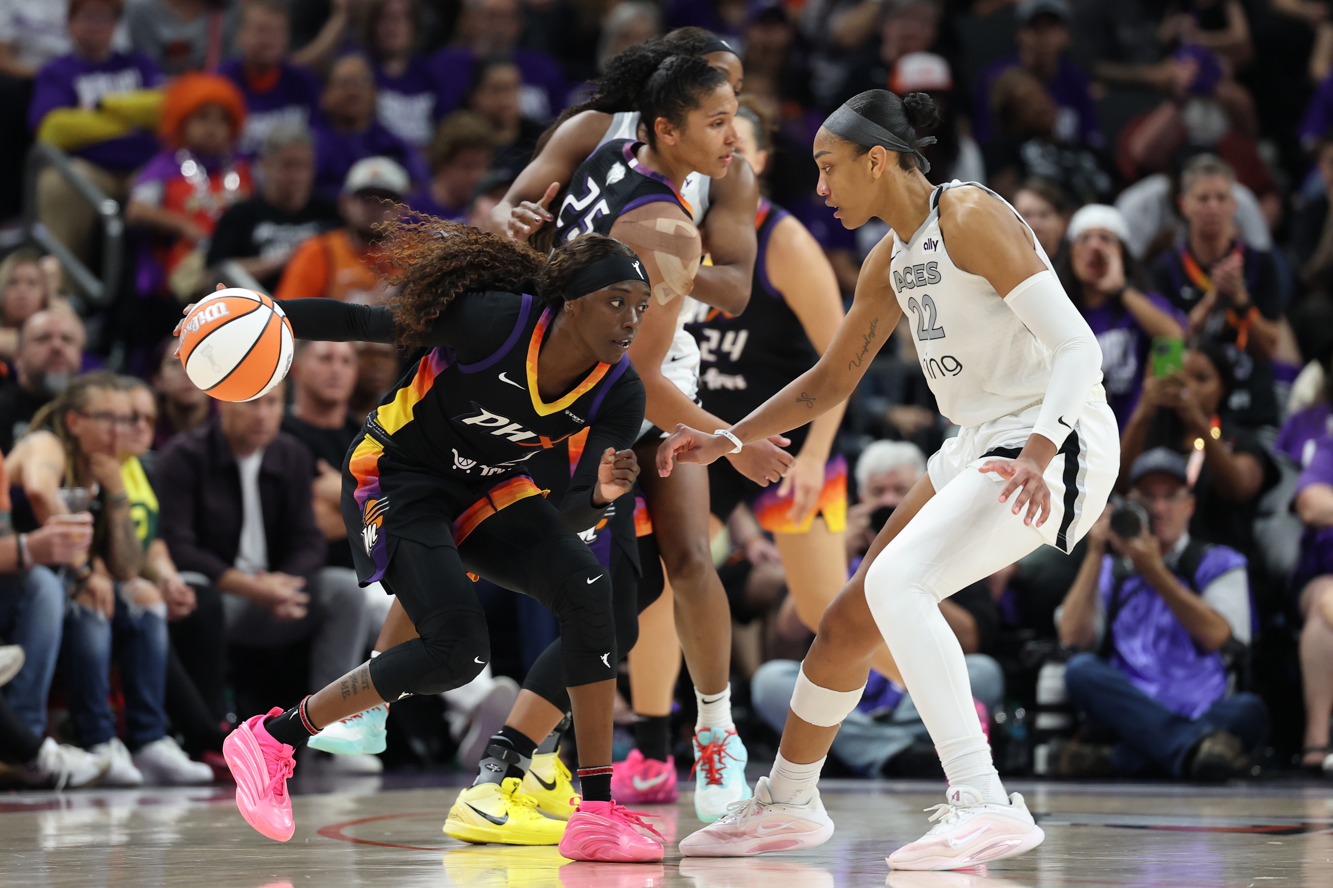 Kahleah Copper #2 of the Phoenix Mercury drives to the basket against A'ja Wilson #22 of the Las Vegas Aces