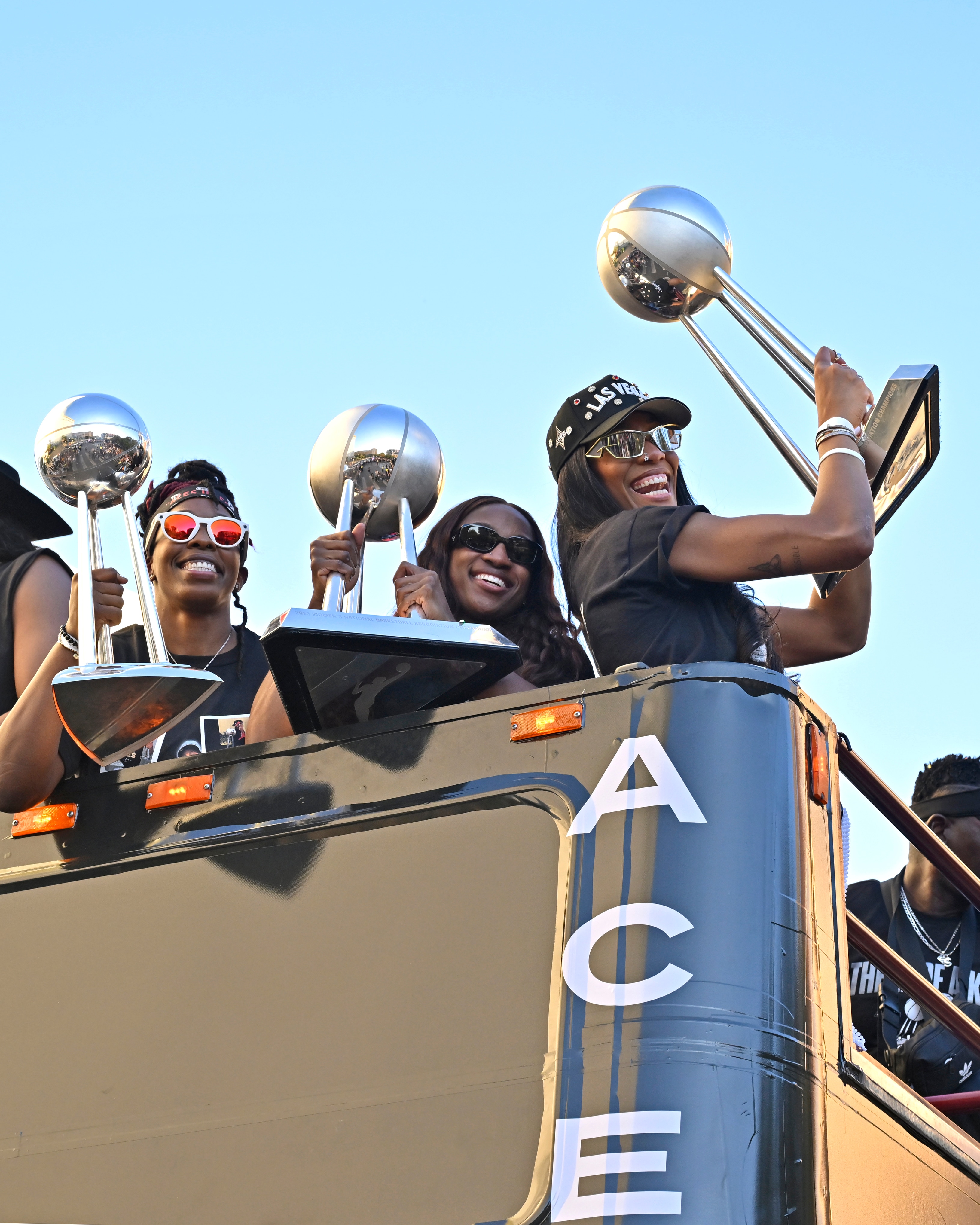 Chelsea, Jackie and A'ja on championship float