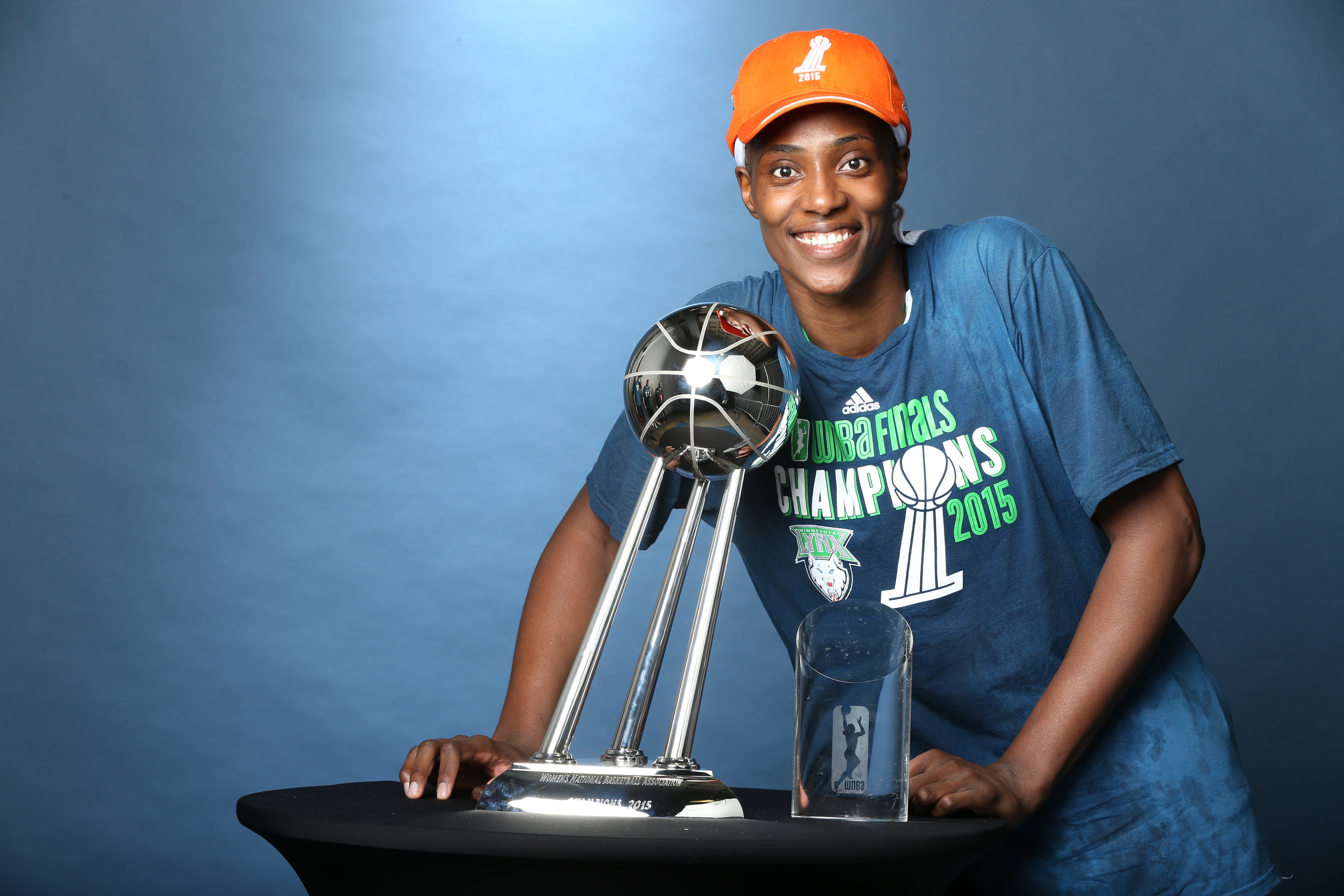 Sylvia Fowles #34 of the Minnesota Lynx poses for a portrait with the WNBA Championship Trophy and Finals MVP Trophy after winning the 2015 WNBA Championship in Game Five of the 2015 WNBA Finals against the Indiana Fever