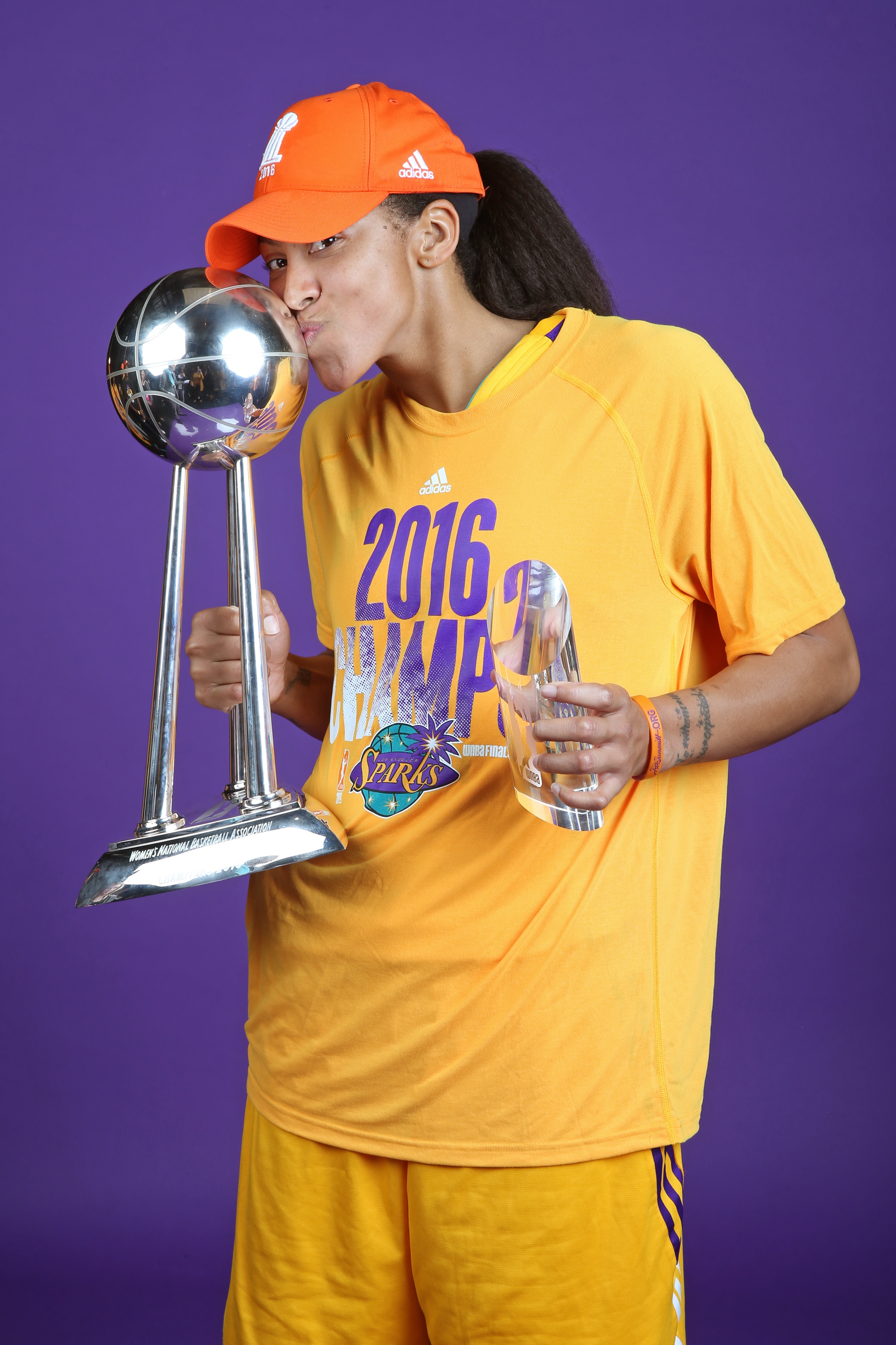 Candace Parker #3 of the Los Angeles Sparks poses for a portrait with the 2016 WNBA Championship Trophy and the Finals MVP Trophy after Game Five of the 2016 WNBA Finals against the Minnesota Lynx
