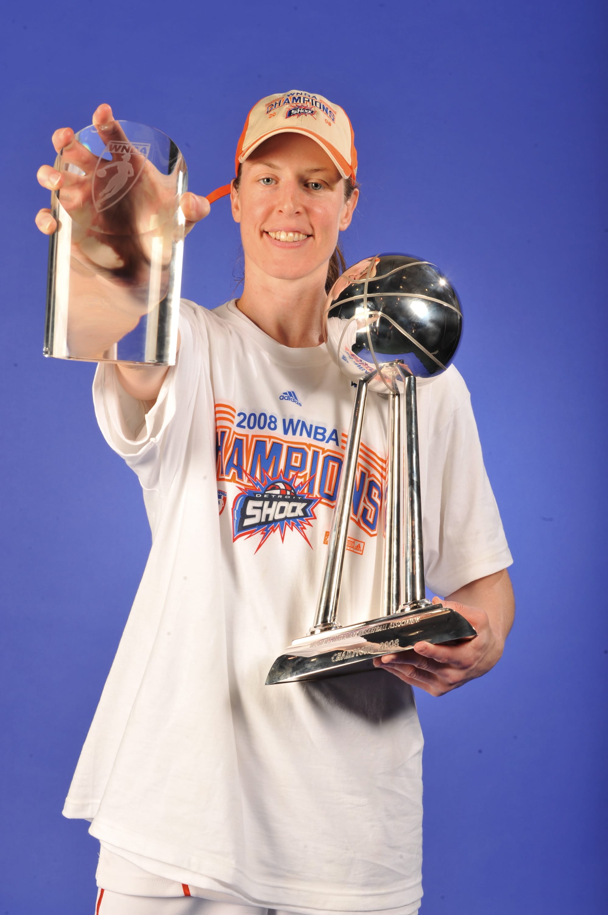 Katie Smith #30 of the Detroit Shock poses for a portrait with her MVP and Championship Trophies after winning Game Three of the WNBA Finals against the San Antonio Silver Starz