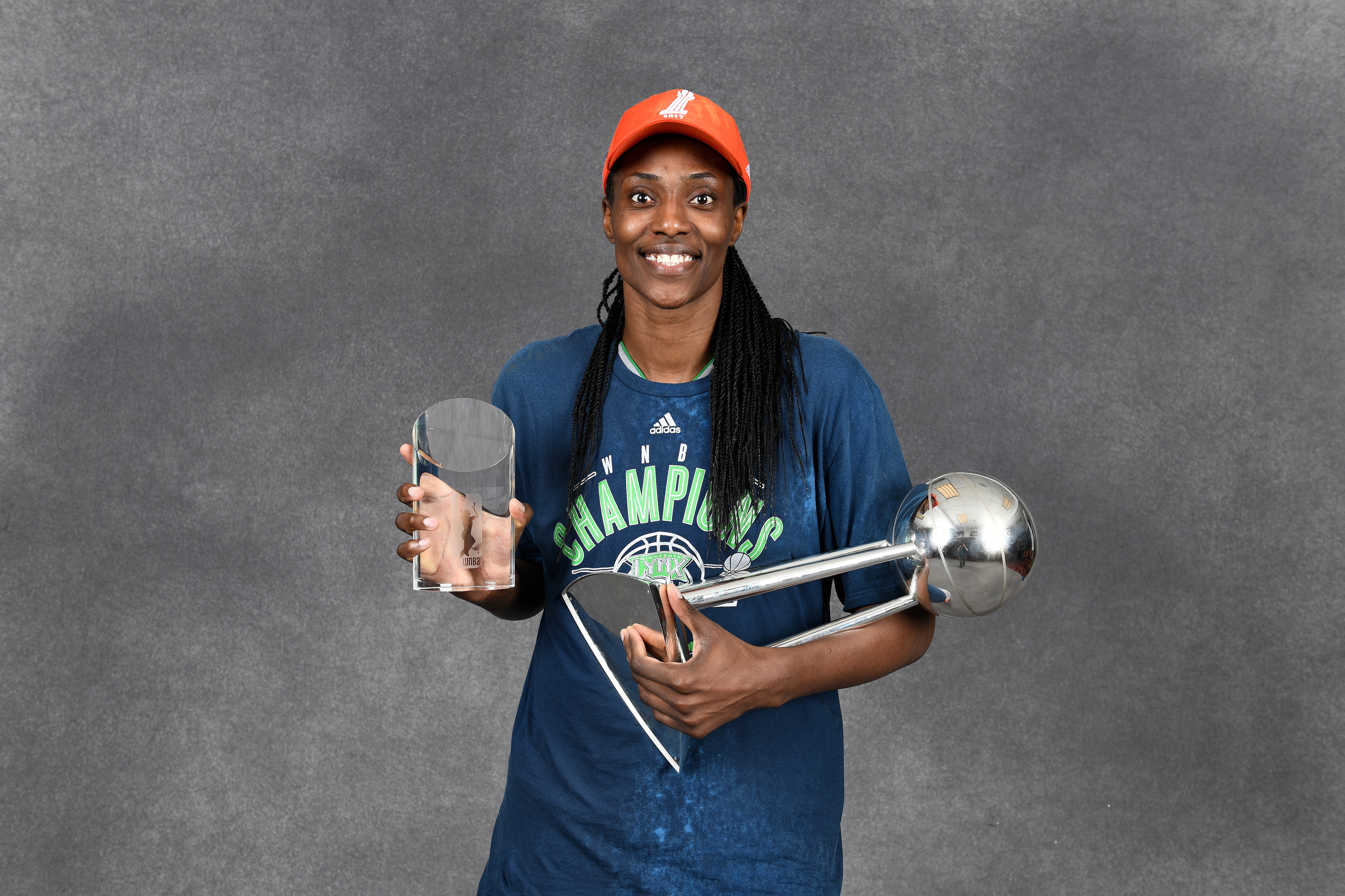 Sylvia Fowles #34 of the Minnesota Lynx poses for a portrait while holding the 2017 WNBA Championship trophy and the 2017 WNBA Finals MVP trophy after the game against the Los Angeles Sparks in Game Five of the 2017 WNBA Finals