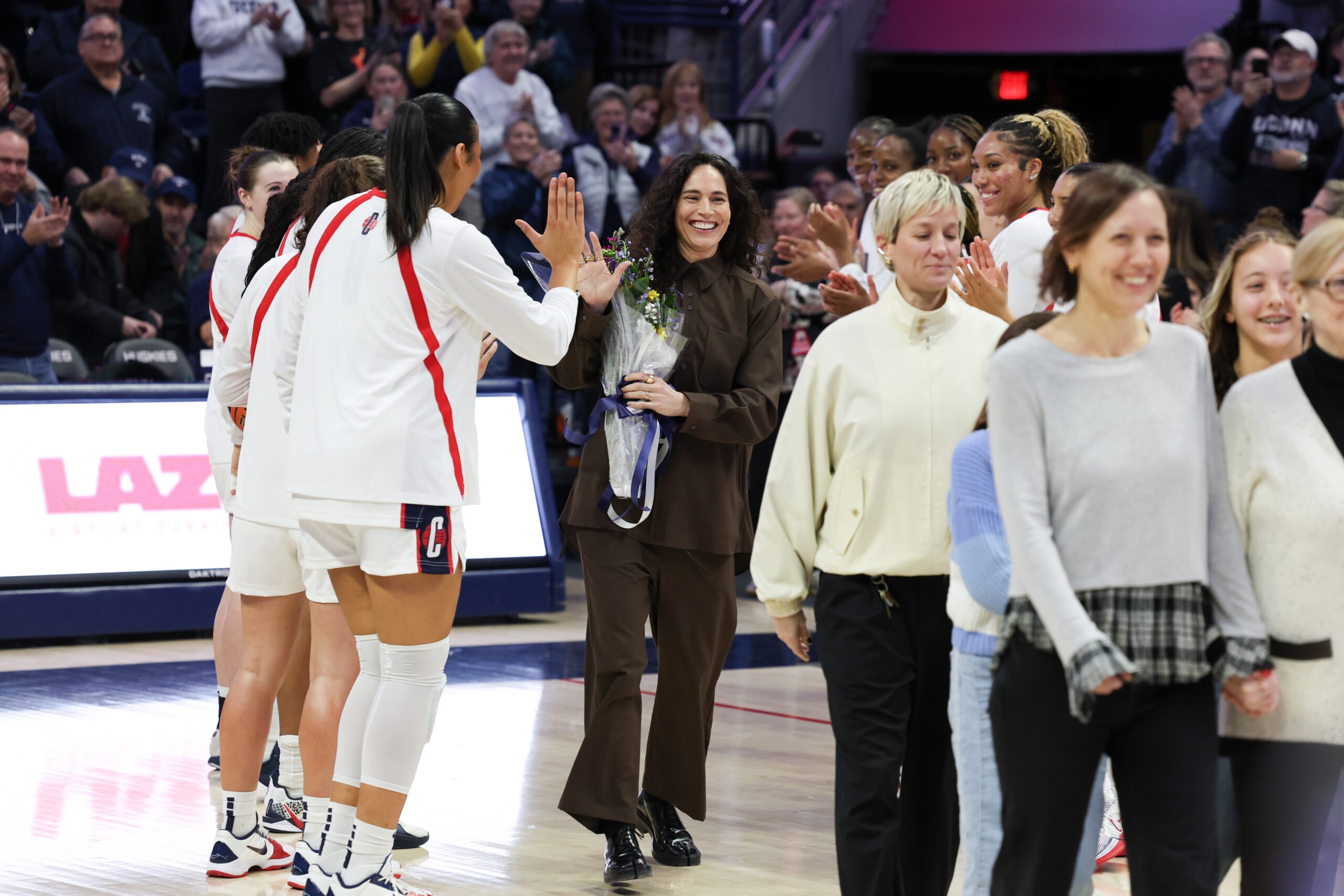 Former Connecticut Husky Sue Bird has her jersey number retired before an NCAA women’s basketball game against the DePaul Blue Demons at Harry A. Gampel Pavilion on December 07, 2025 in Storrs, Connecticut.