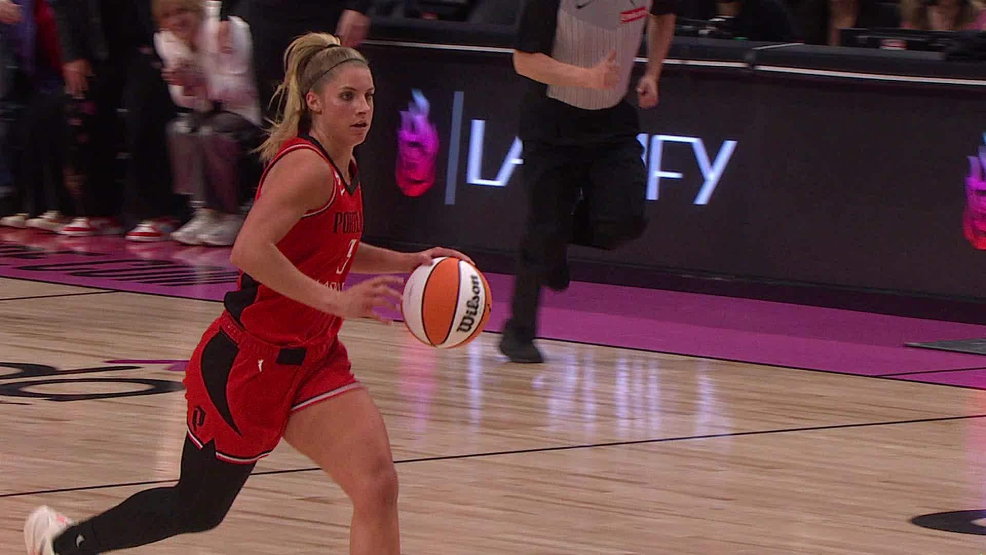 Sarah Ashlee Barker scores and draws the foul
