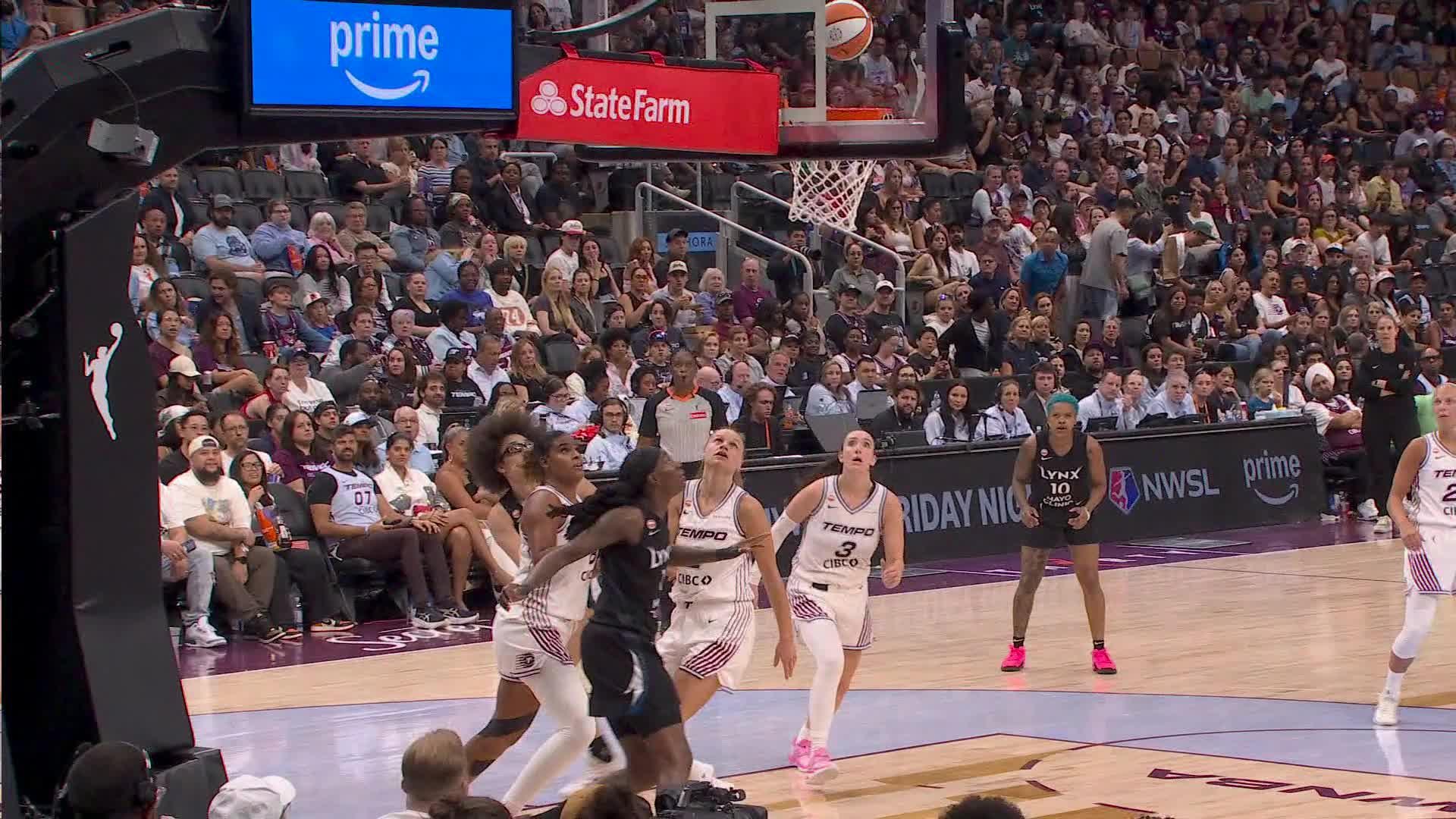 Natasha Howard with the And-1!