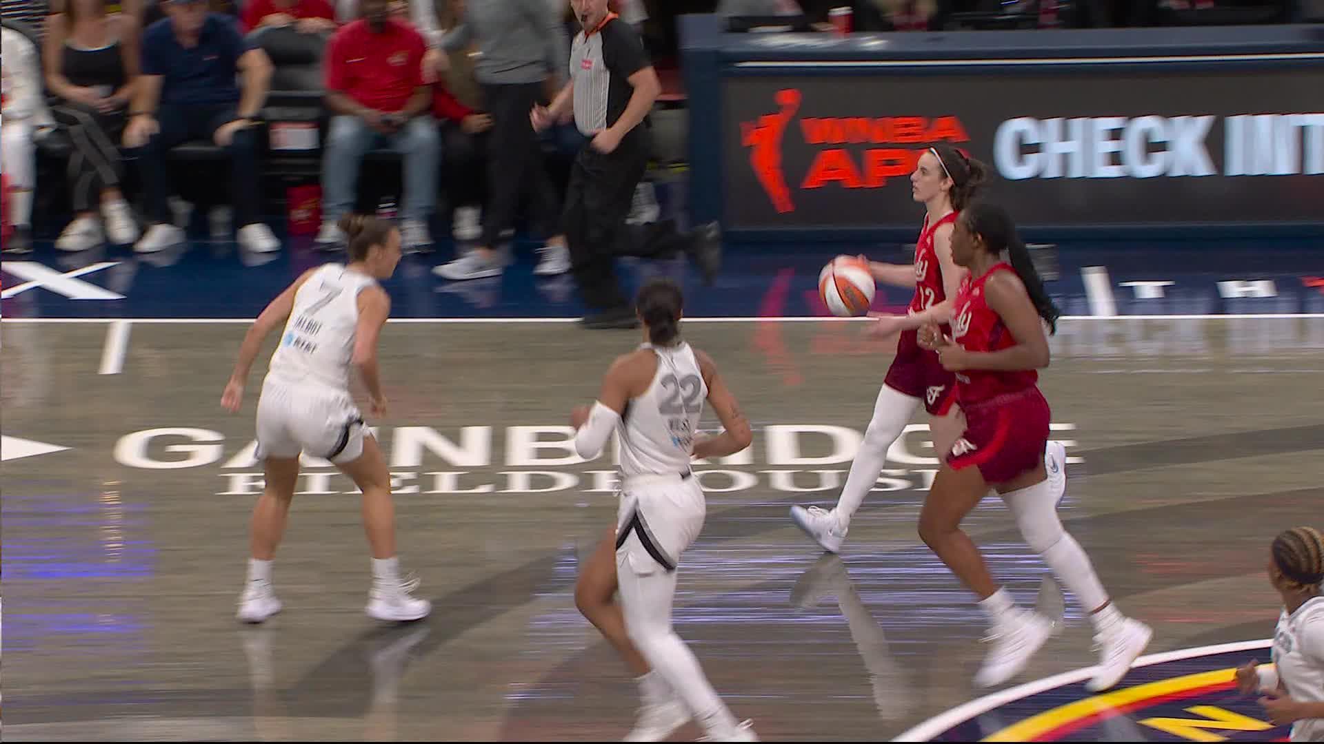 Caitlin Clark dials from long distance